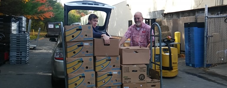 Martin's son on a food rescue mission. Food Rescue U.S. Photo. 