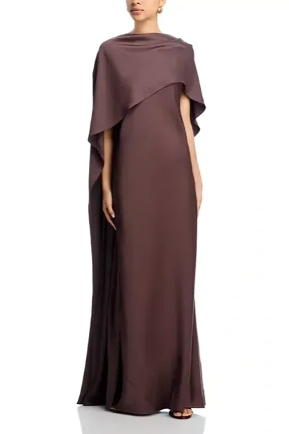 Espresso high drape neck gown with short cap sleeves and a long cape overlay.