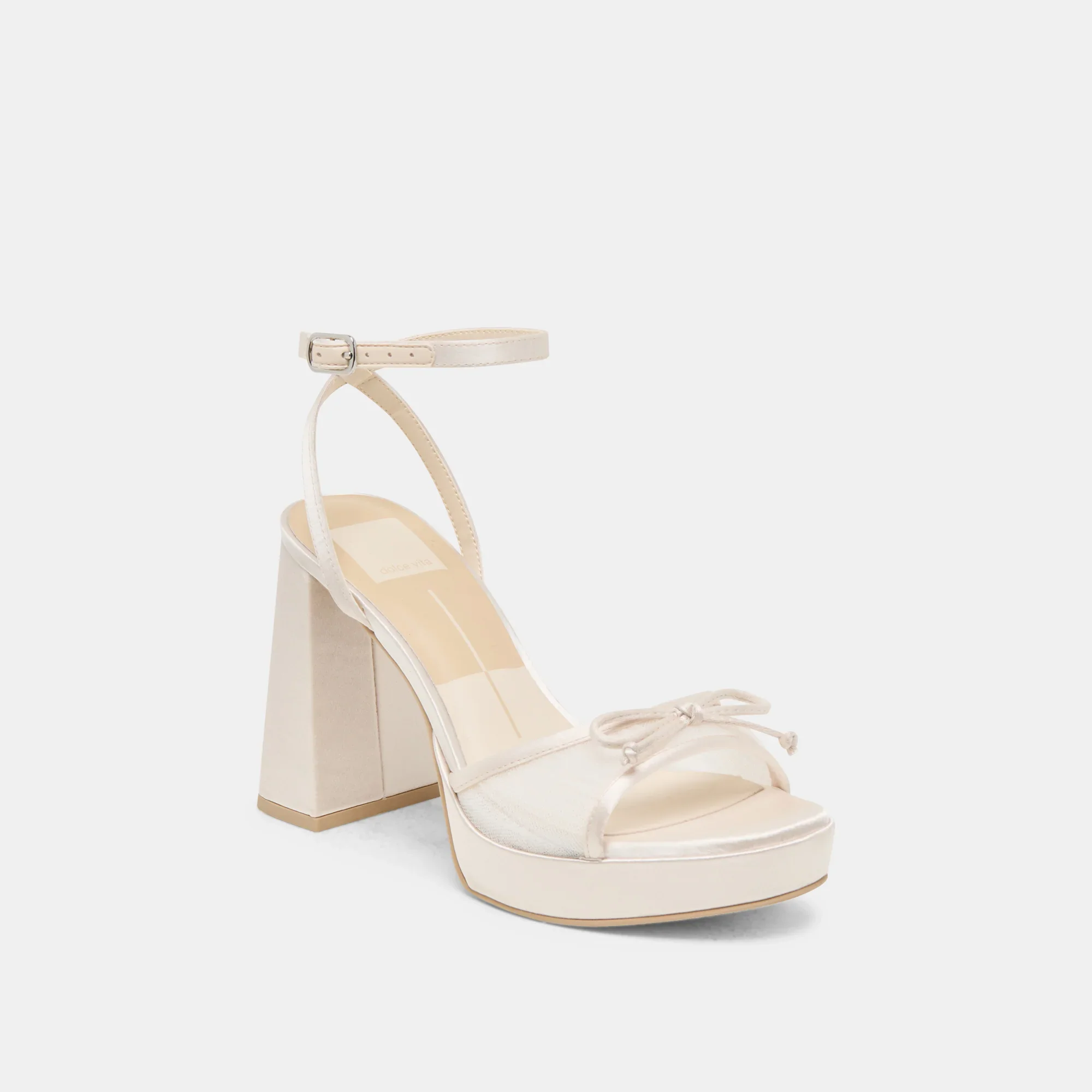 Chunky platform heels with white tulle and small bow detail.