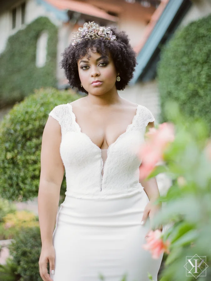 makeover station hair and makeup garden wedding white gown plunging neckline