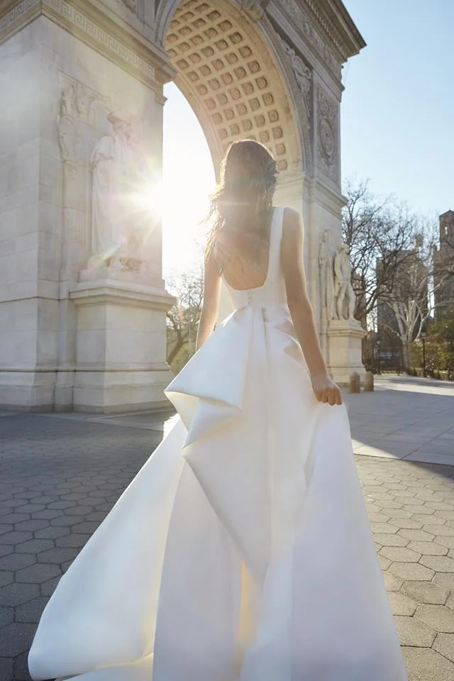 monique lhuillier clean classic wedding gown new york designer