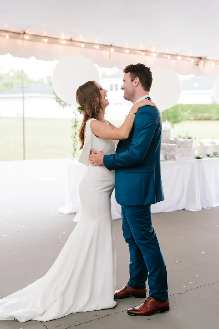 Low back wedding dress with cowl backline perfect for a Florida wedding
