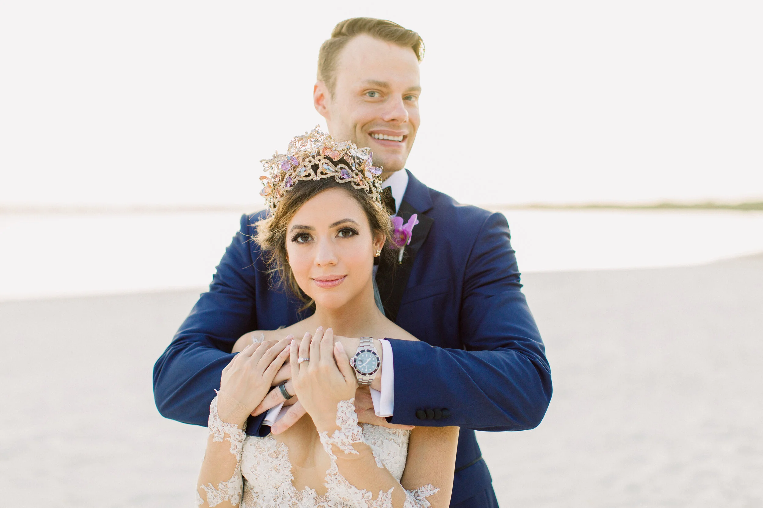 real bride wears lazaro crown by maria elena headpeices to beach destination wedding in cancun