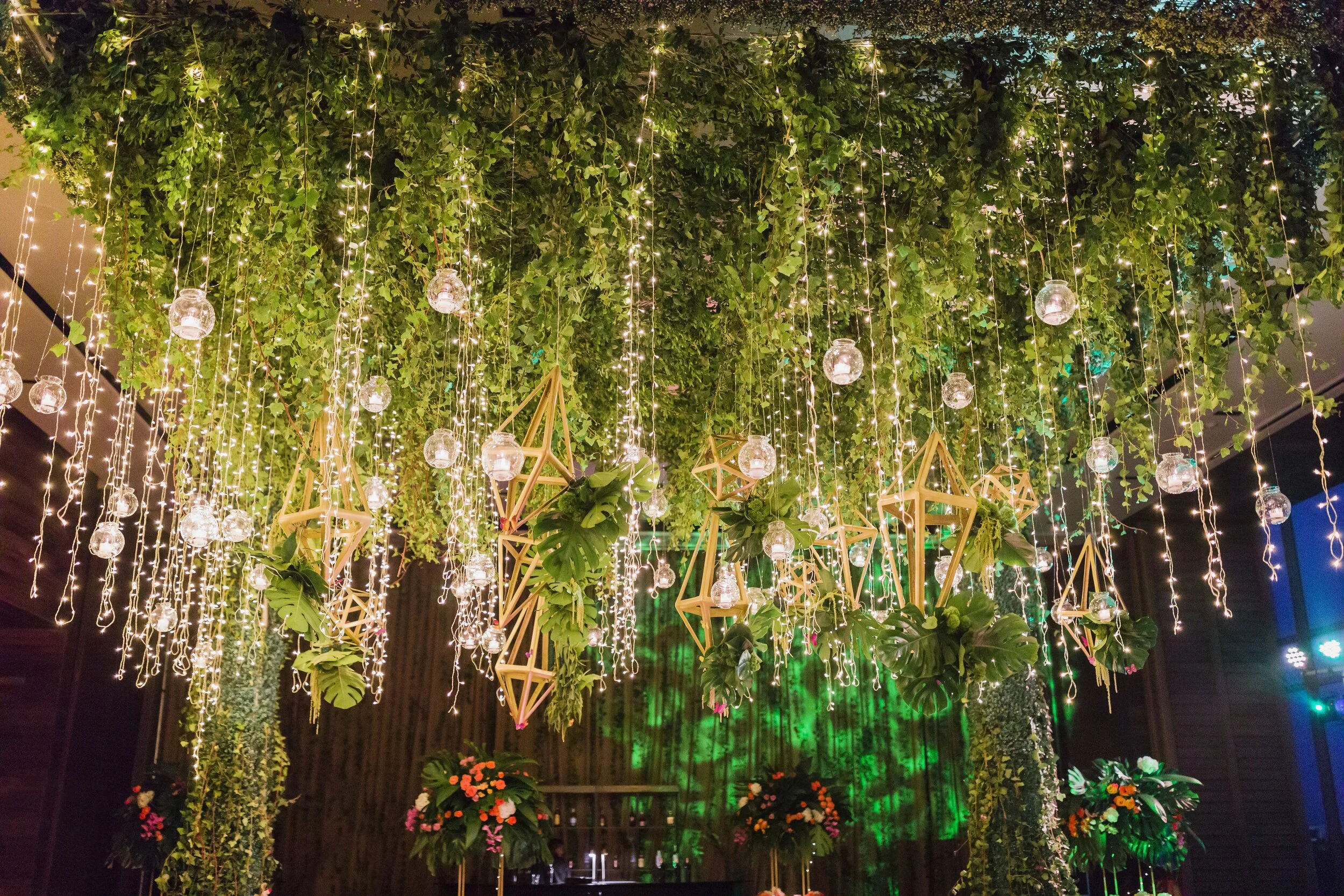 nizuc cancun resort under greenery and lights at wedding reception