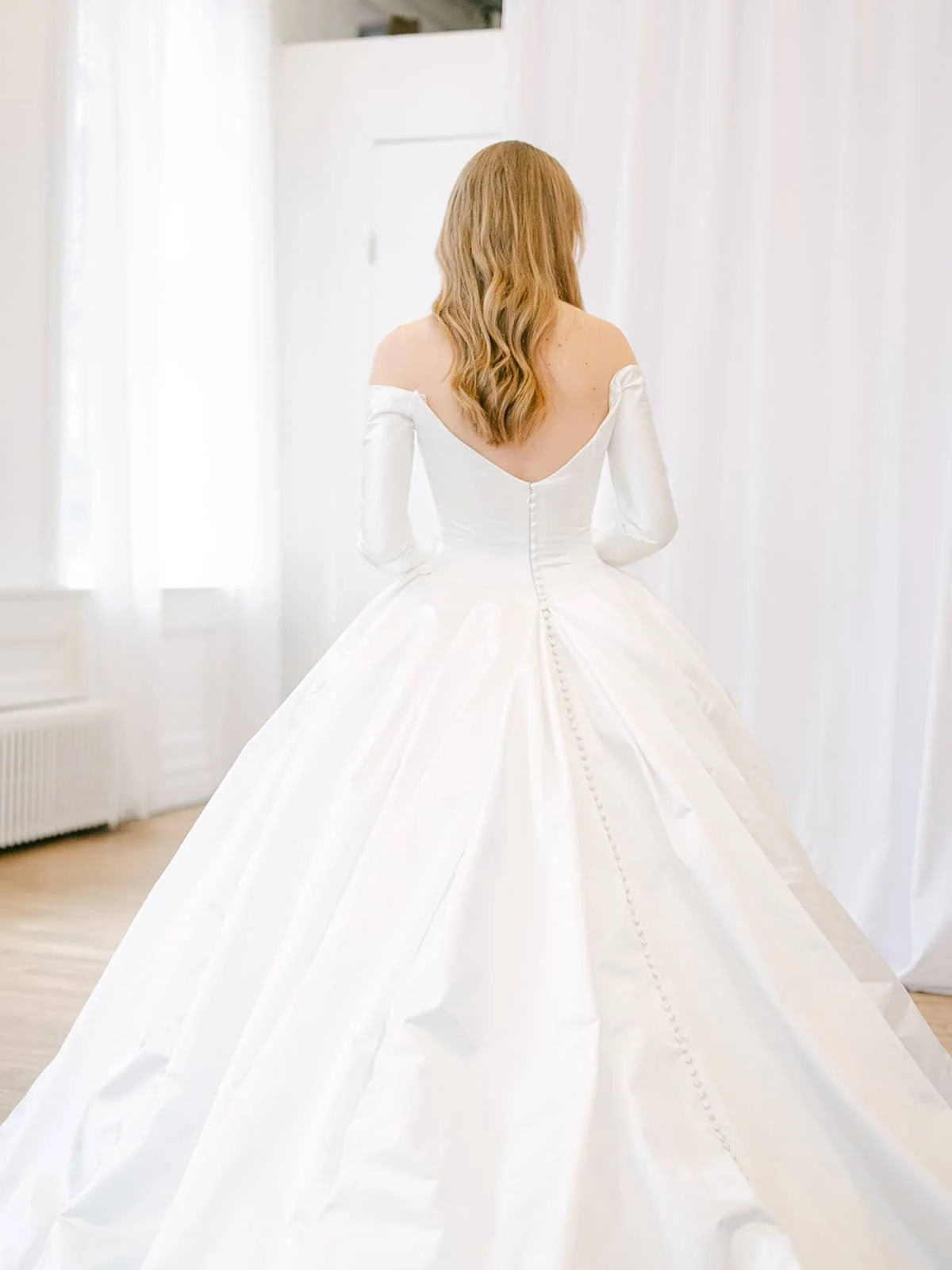 clean ballgown with long sleeves, clean ballgown with crinoline, ballgown with full skirt, full skirt wedding dress, ines di santo ballgown