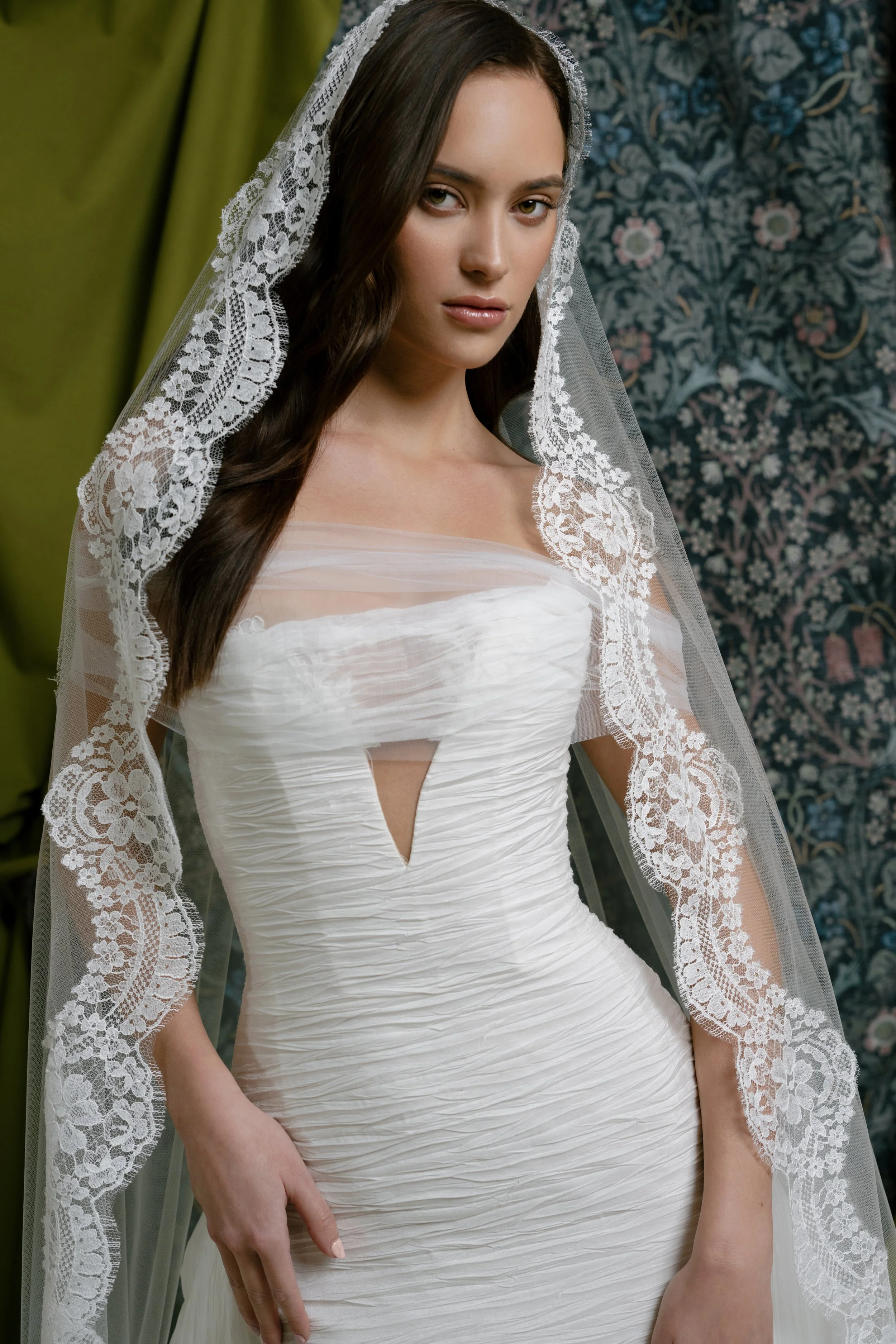 bridal shop in orlando in a lace mantilla veil with ines di santo strapless dress