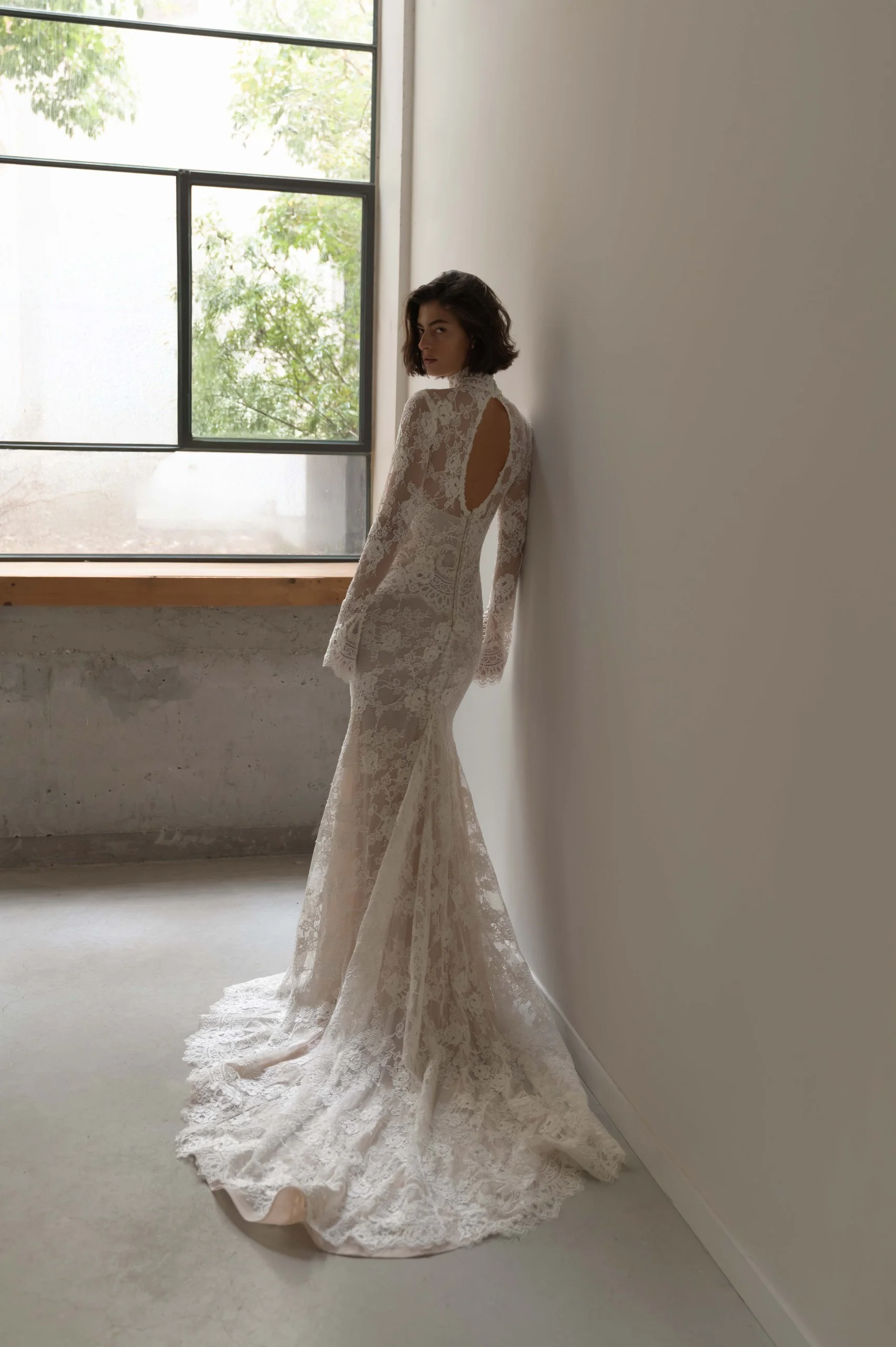 Full long sleeve and high neck lace wedding dress by Lihi hod. Keyhole wedding