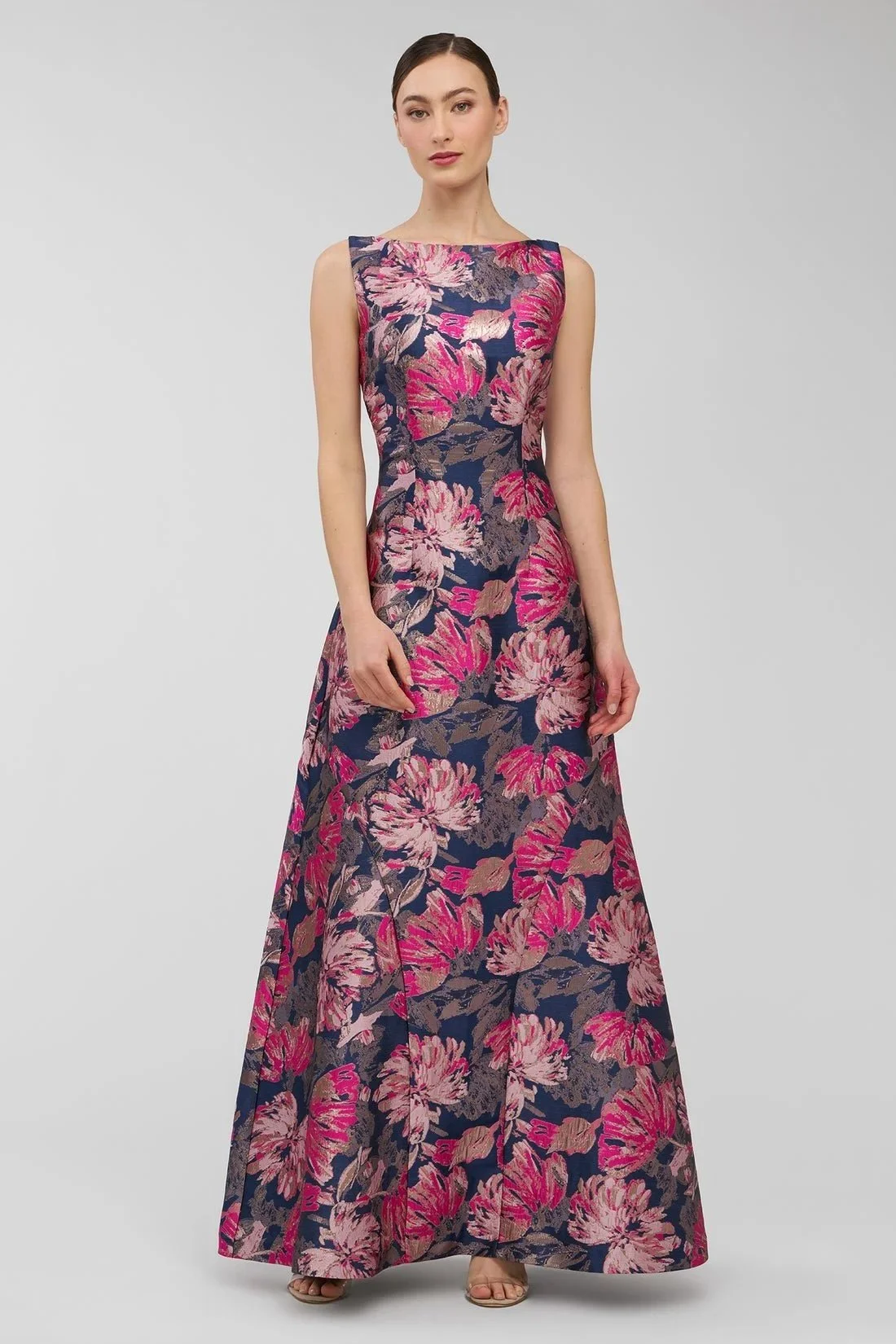 Metallic floral jacquard gown with a bateau neckline and scoop back.