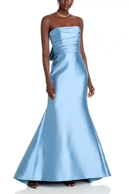Formal strapless fit and flare gown with a layered bodice and elegant fabric draping on the back.
