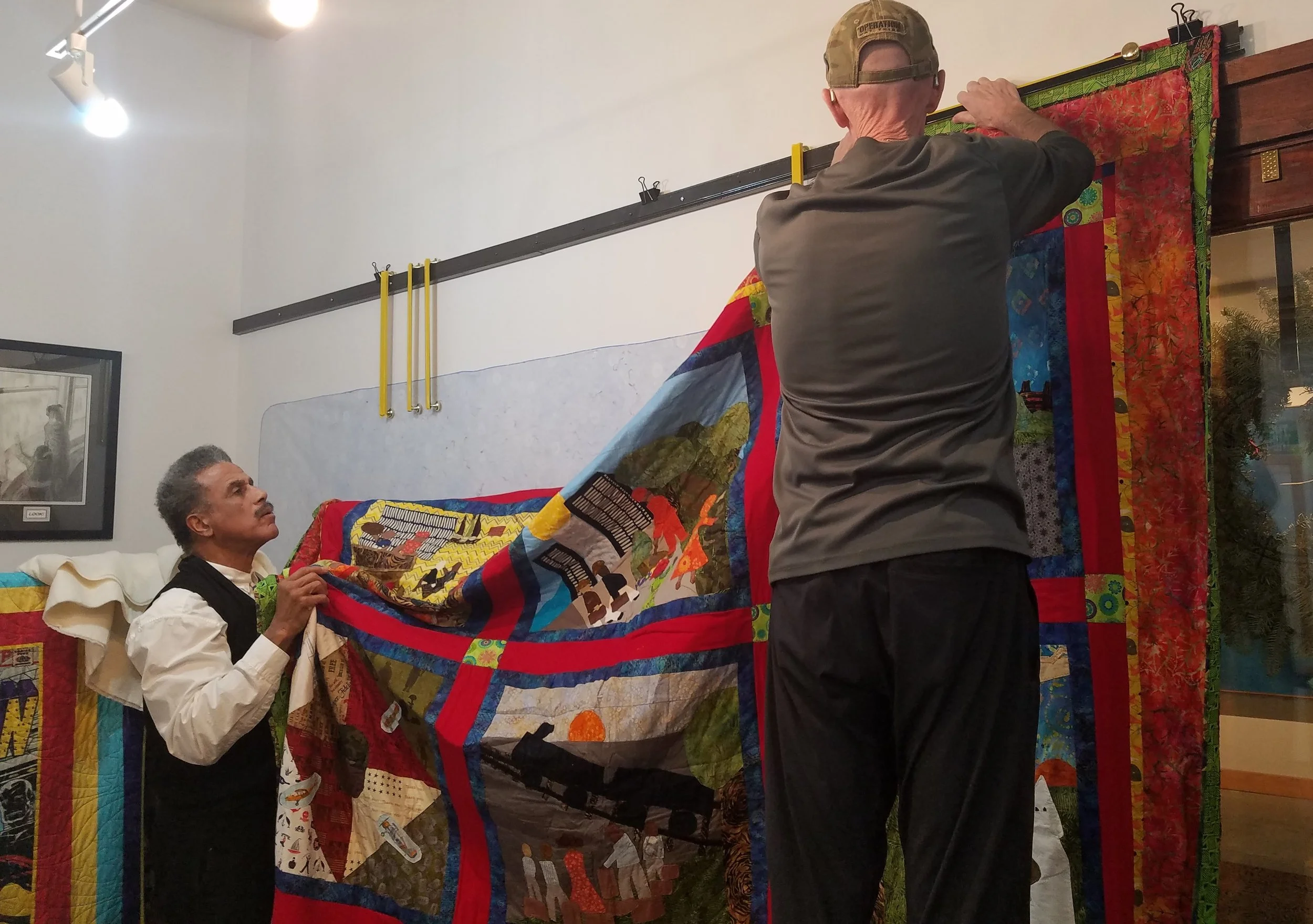 The first quilt going up on the design wall courtesy of John and John. This is one side of the “Freedom to Liberty” quilt.