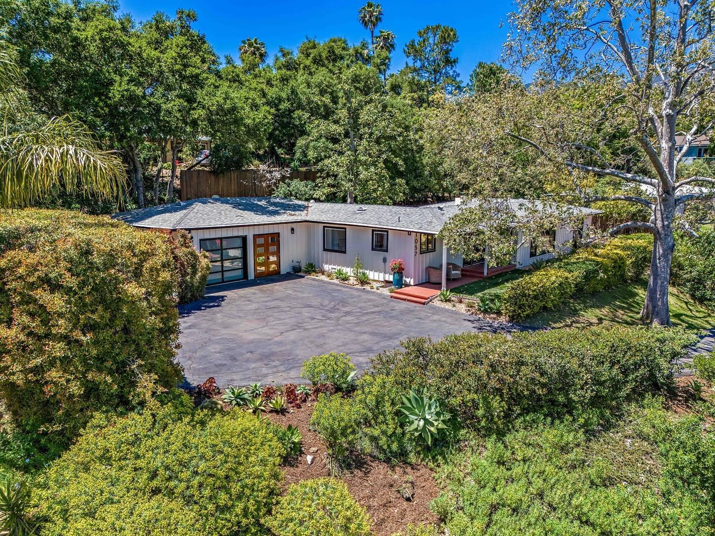 1057 Tunnel Road. Come see us today from 10am-1pm! Mission Canyon Mid-Century 3 bedroom, 2 bath home in a tranquil setting with beautiful mountain views, situated on just under a half acre. Spacious living &amp; dining area with vaulted open beam cei