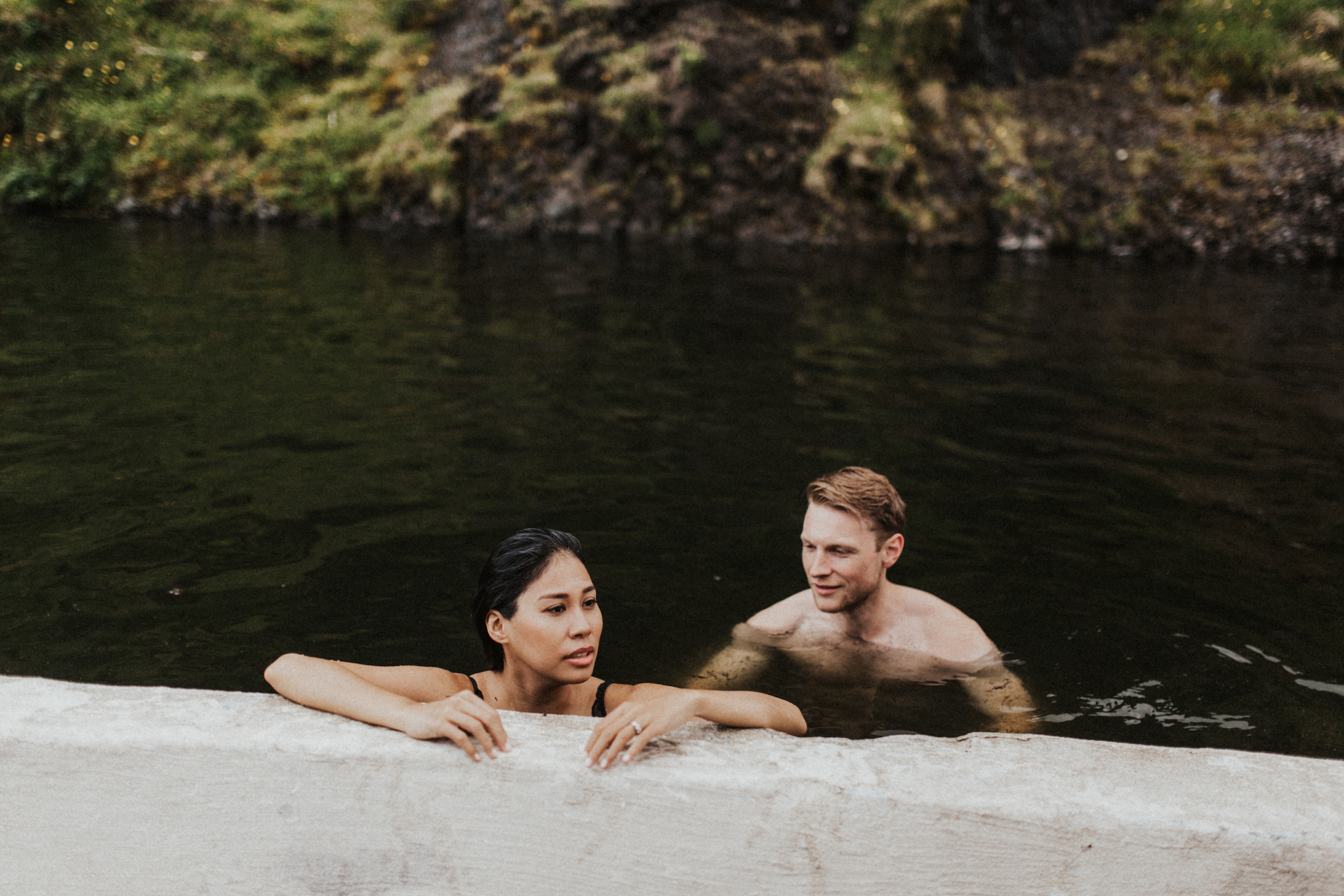 Couple in Seljavallalaug hot springs Iceland.jpg