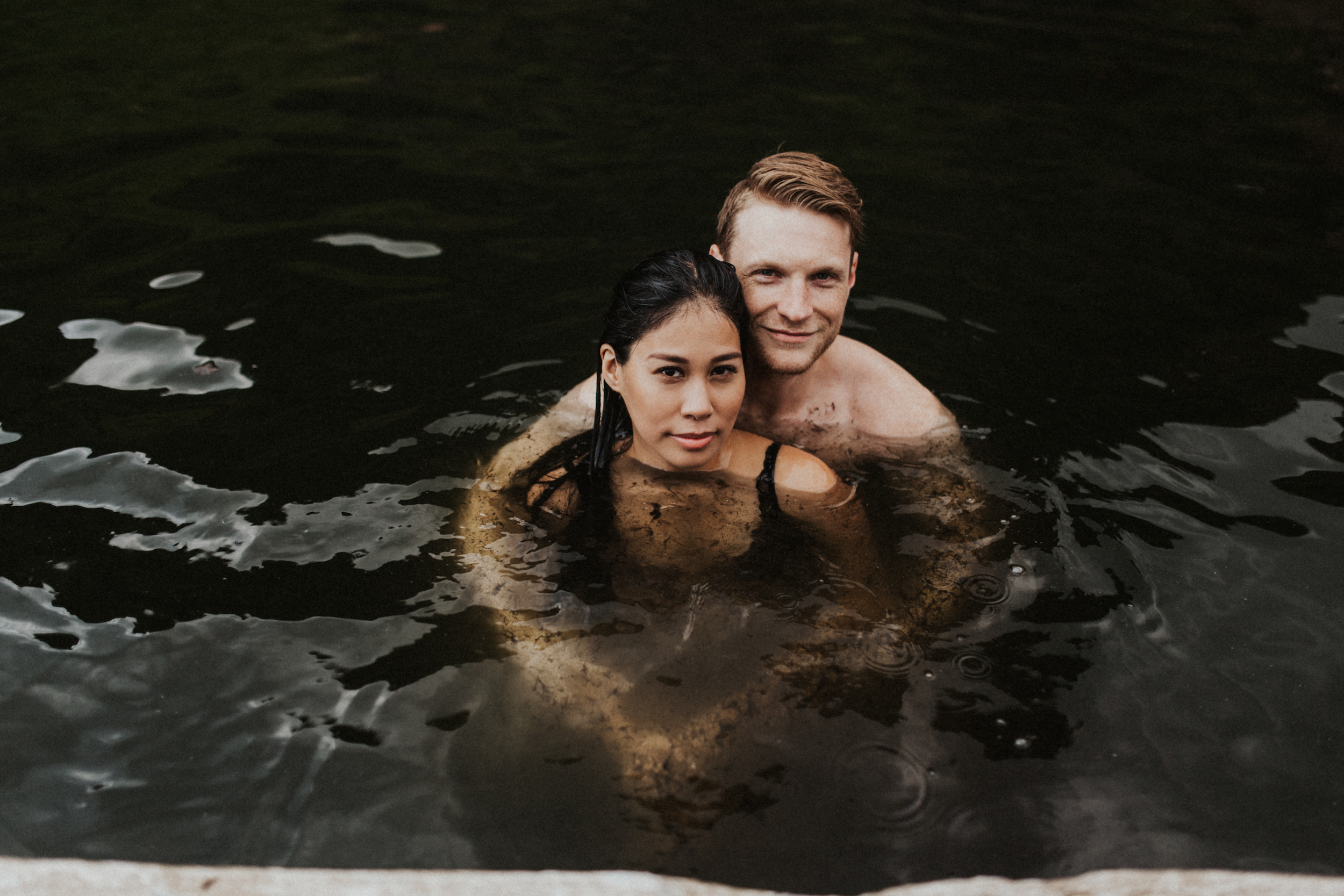 Stunning couple during anniversary photo session in Seljavallalaug hot springs Iceland.jpg