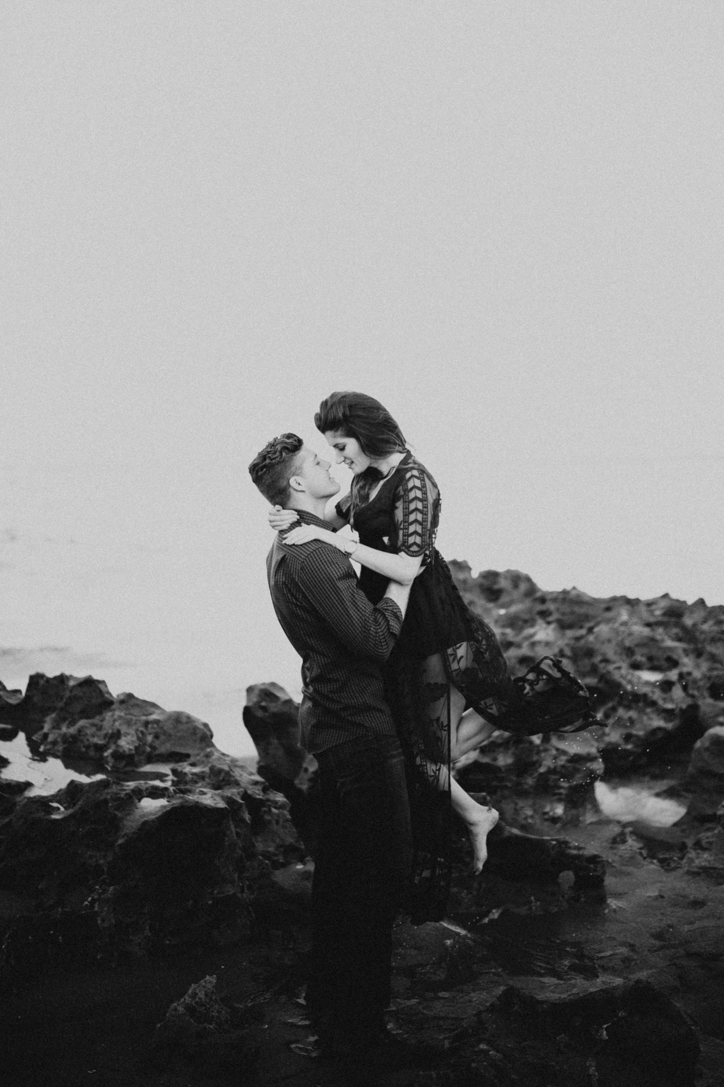 black and white engagement photos blowing rocks preserve.jpg