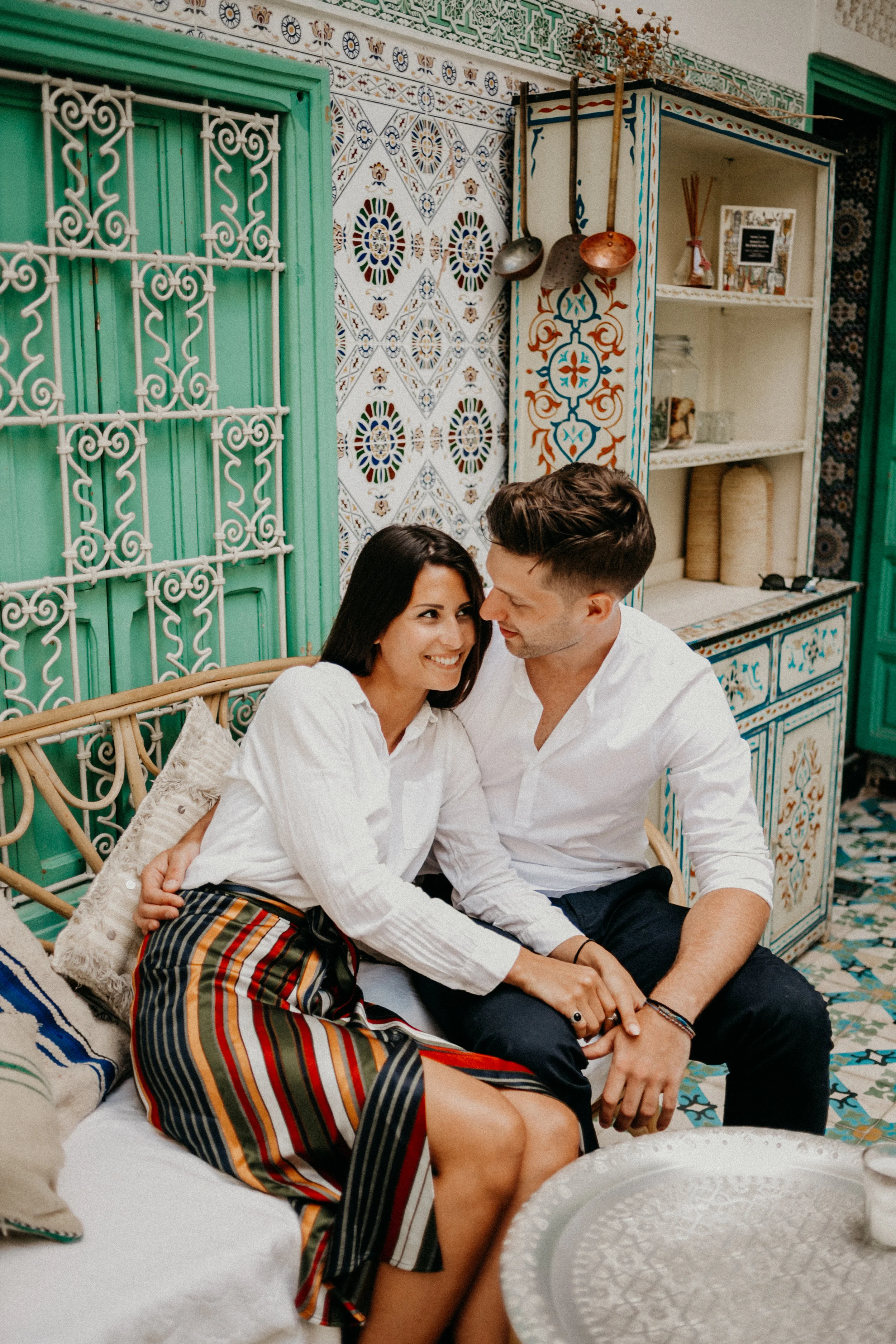 couple snuggling in marrakech riad.jpg
