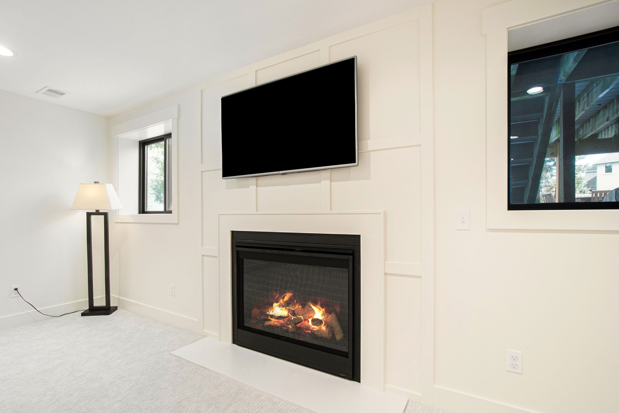 basement fireplace. fireplace built in. custom fireplace surround..jpg