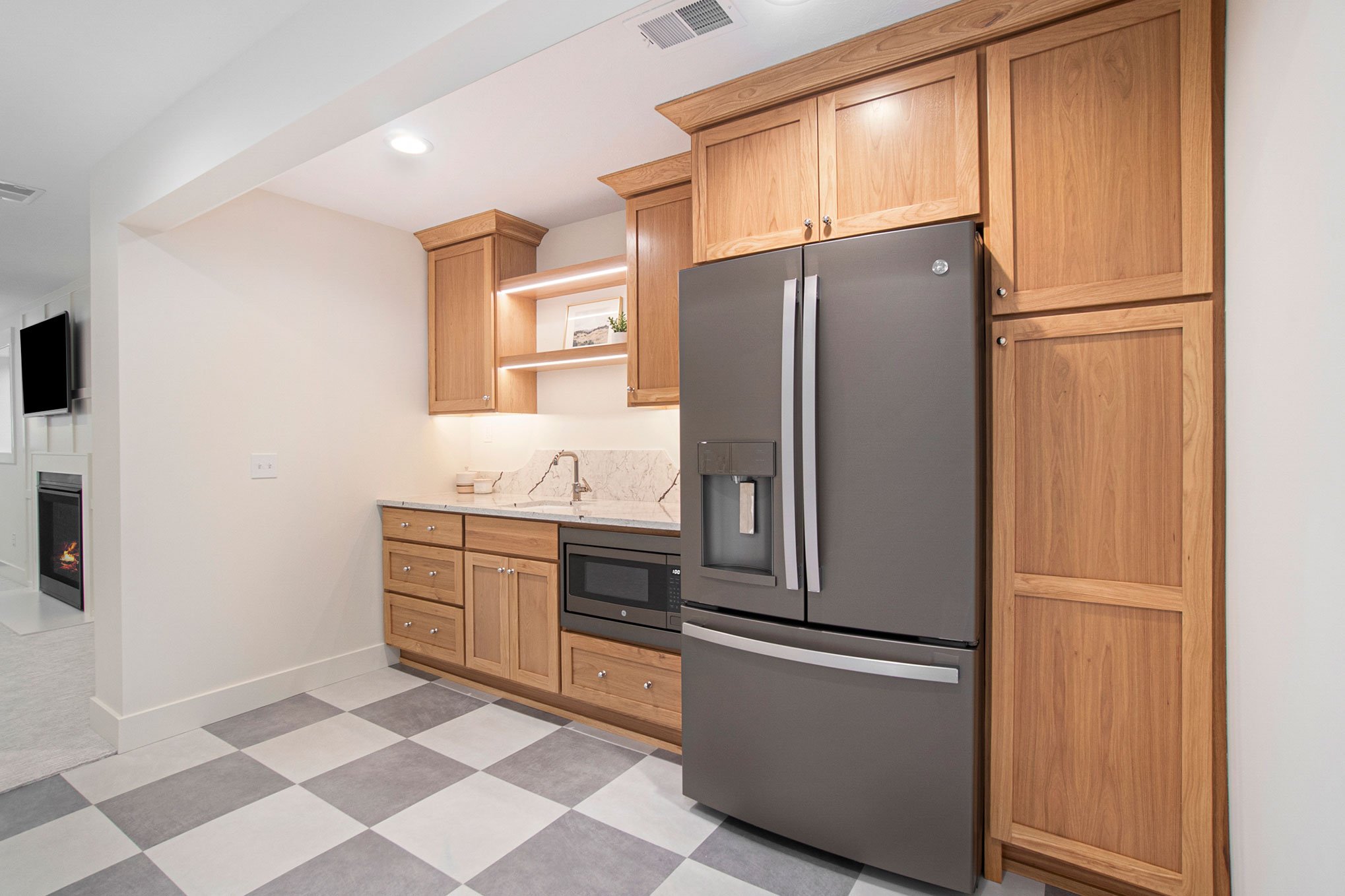 kitchenette. custom cabinetry. stained cabientry. checkered flooring. trendy floor.jpg