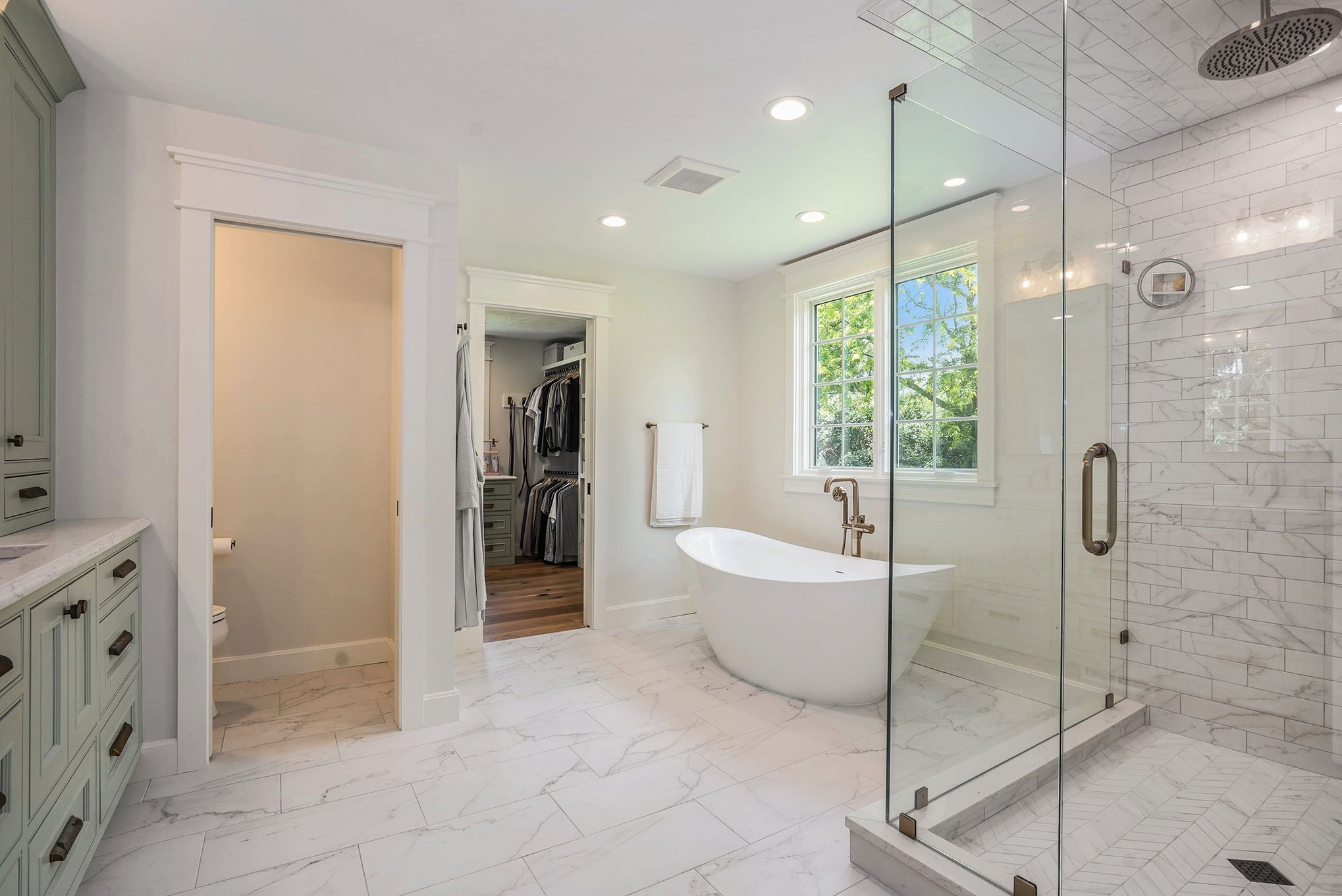 master bathroom. tile shower. soaker tub. toilet room..jpg
