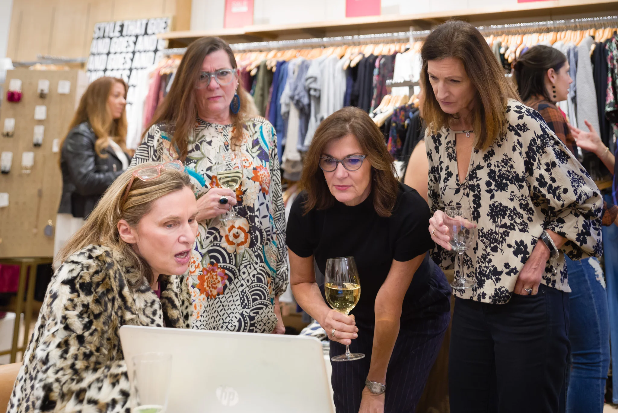 Pamela showing the ladies the her site. Photo by Folrev Photography