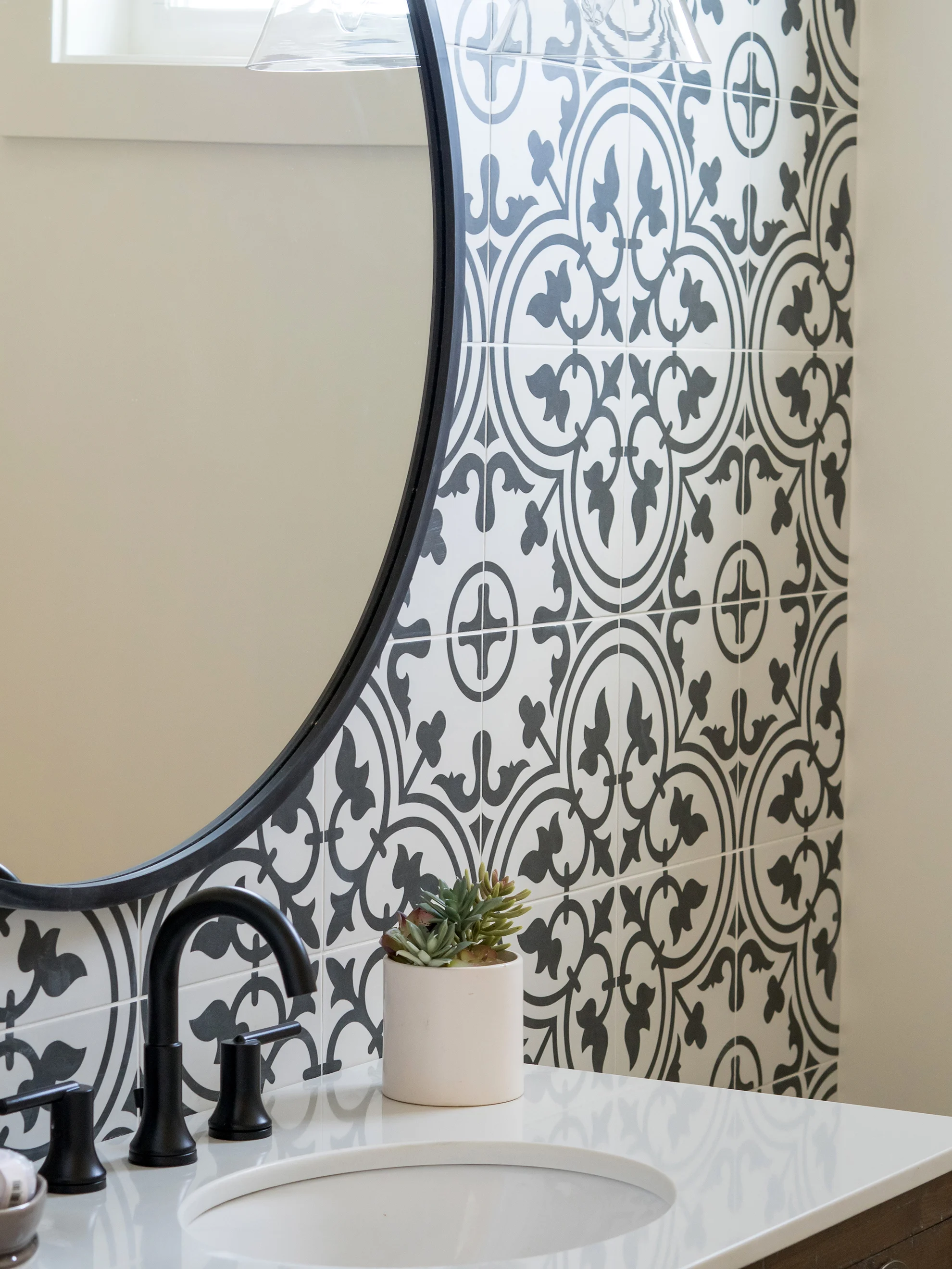 This tile was meant for the floor but, we placed it on the wall for a real WOW! guest bath.