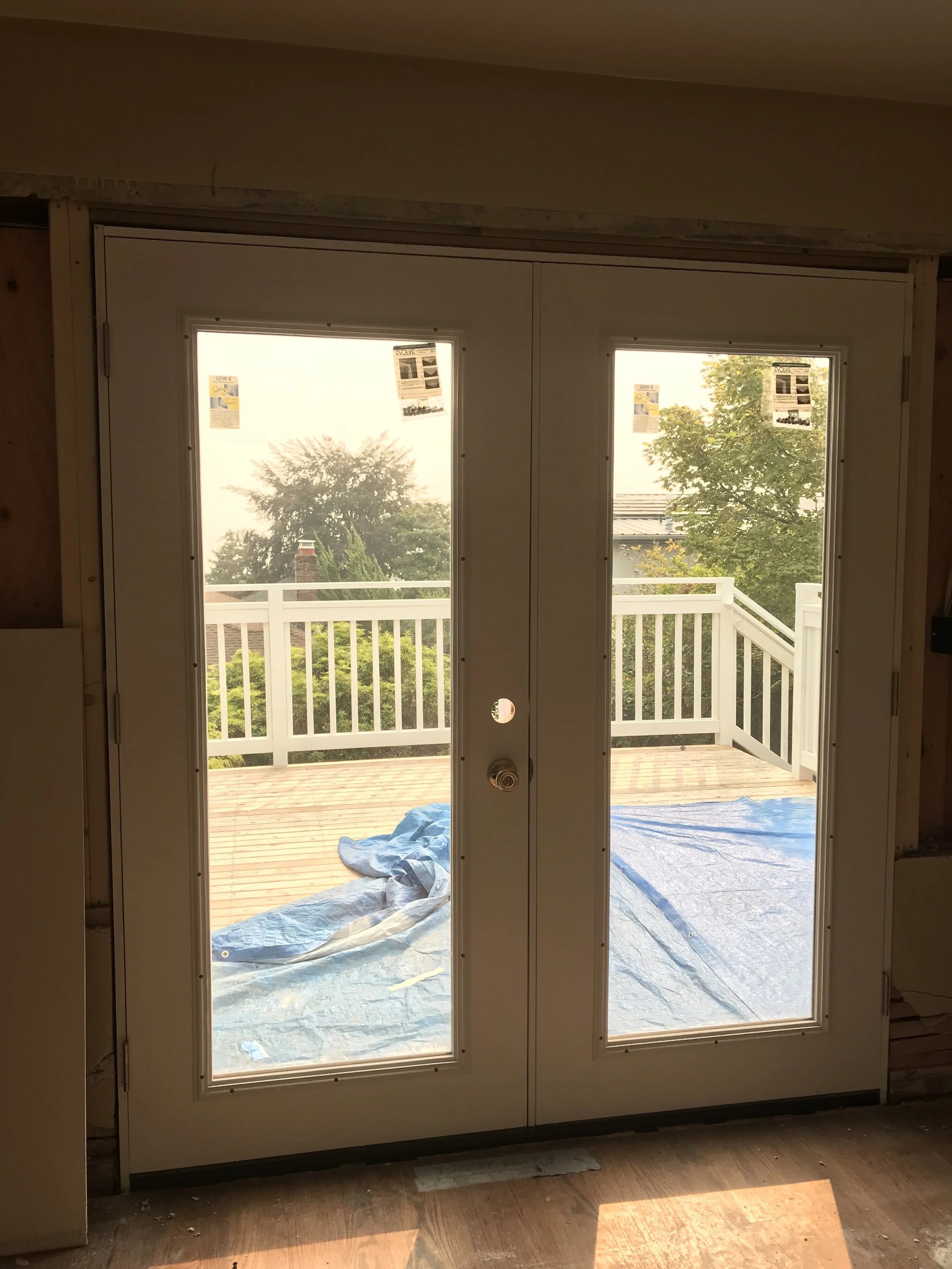 Voila! We have access to the new outdoor space with the addition of these french doors.