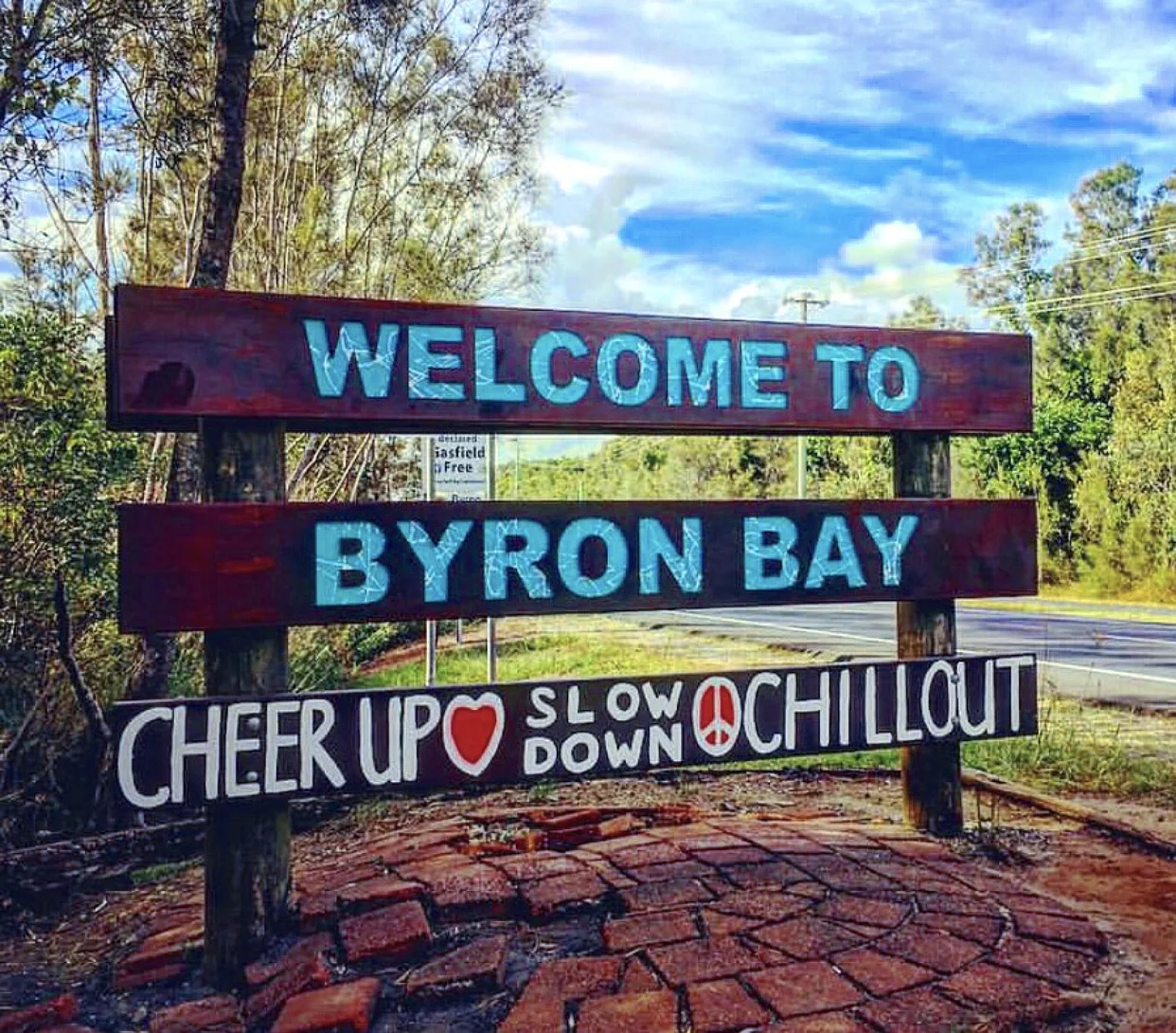 "Welcome to Byron bay, cheer up, slow down & chill out".