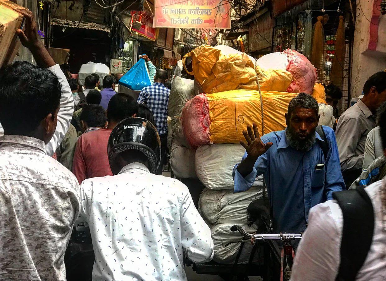 Everyone and everything trying to squeeze through the narrow streets of Old Delhi.