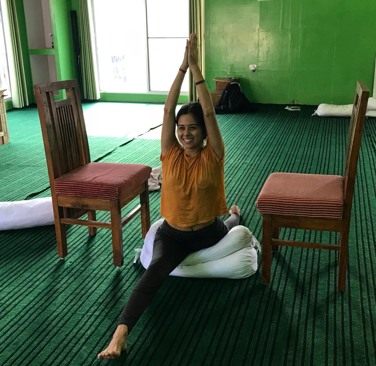 Lauren mastering preparations for the splits. 