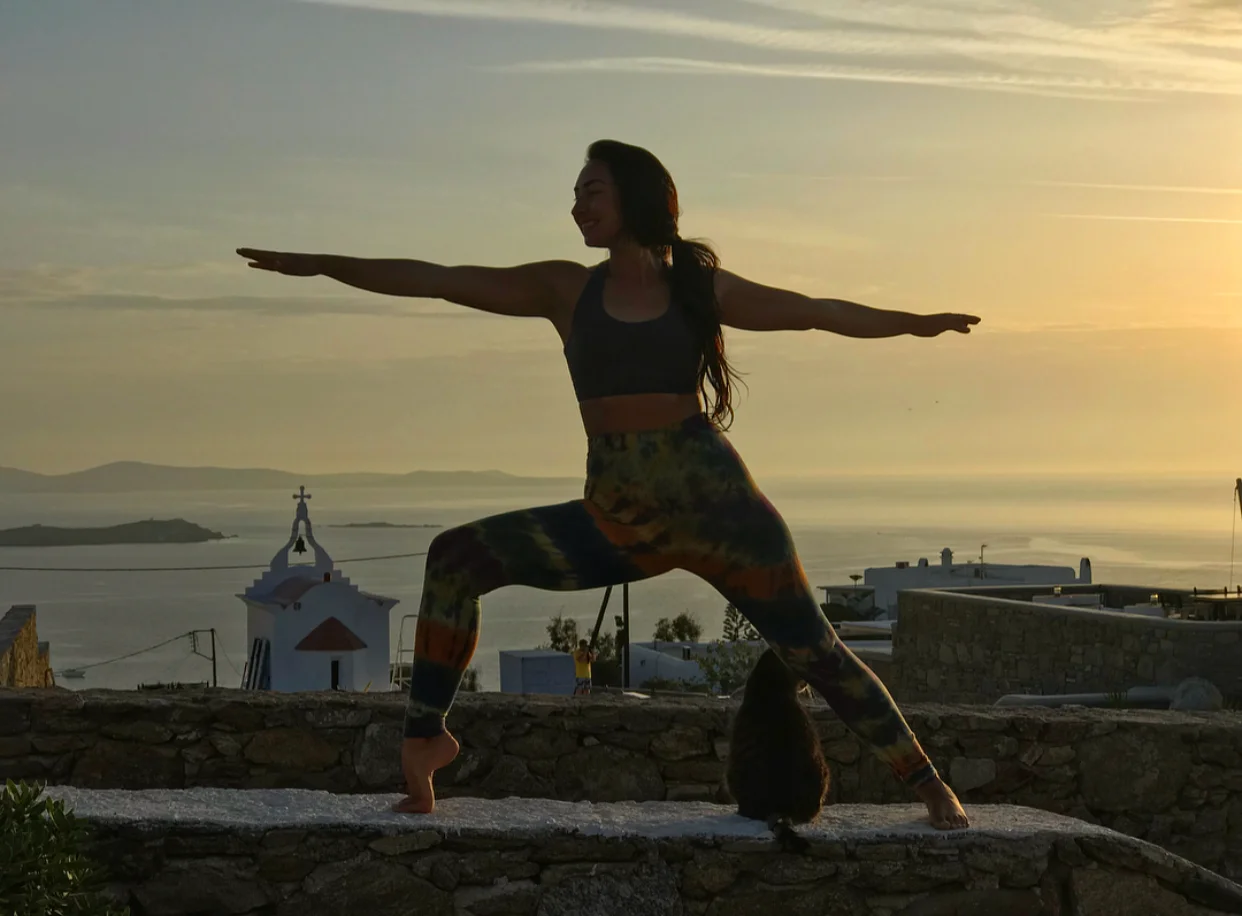 Embracing my peaceful warrior spirit with the Warrior 2 asana and Tiger the cat