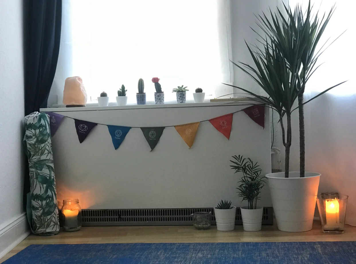 The beautiful yoga space I’ve created in our bedroom.