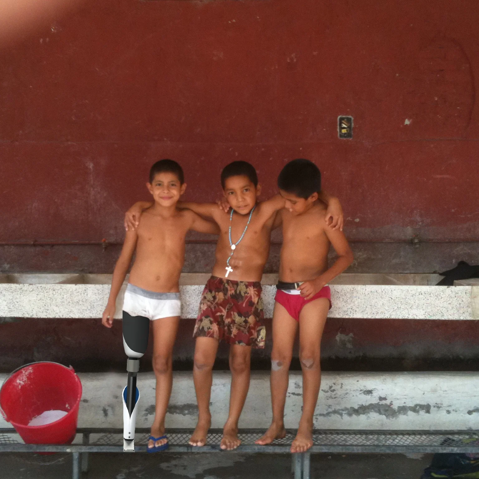 boys standing at a pool in context.jpg