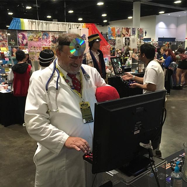 Surprise visit by another retro puzzle master: Dr. Mario! Was an honor to have him stop by and play our game. More pics / video coming later this week! #drmario #cosplay #metrocon