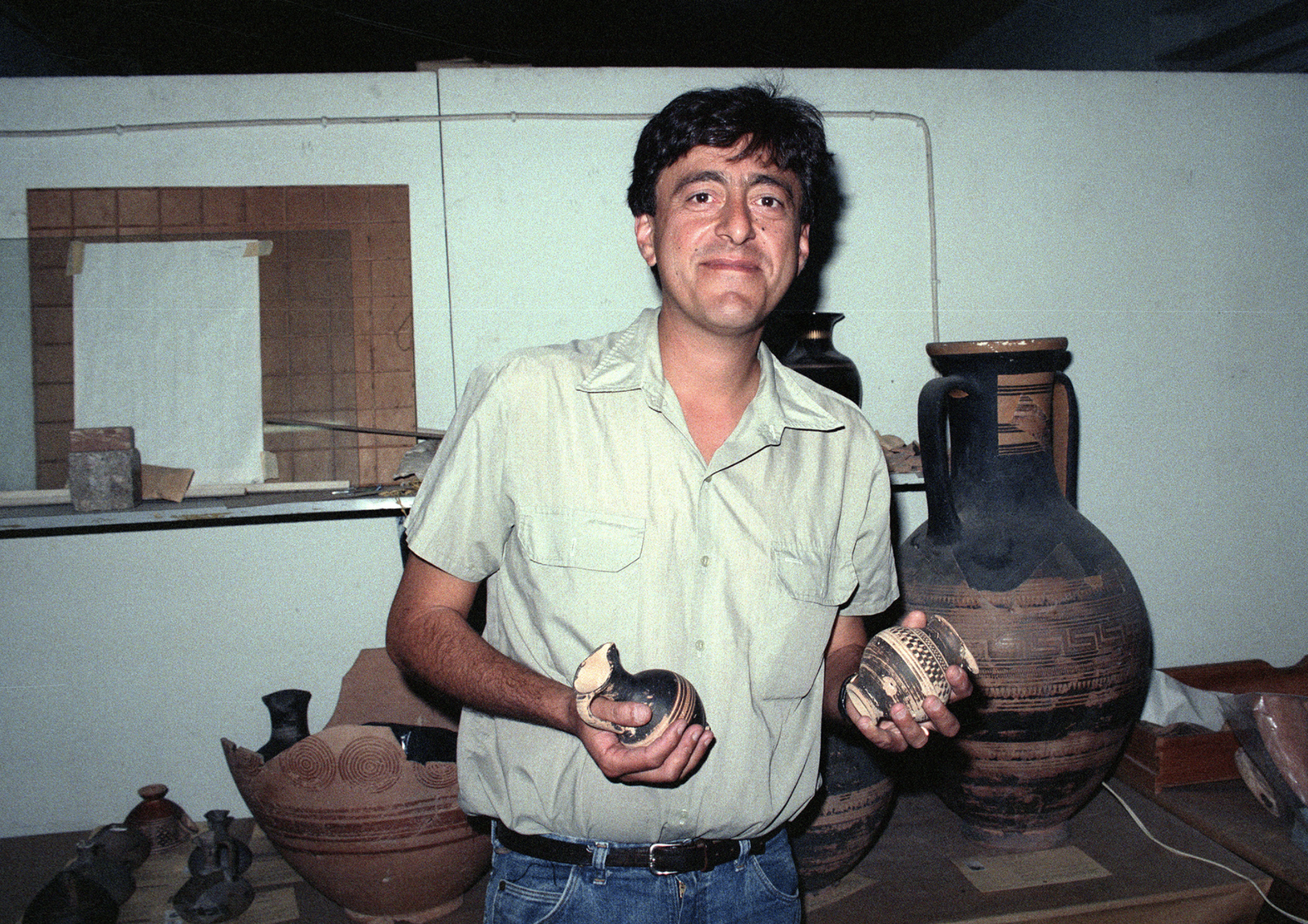 Photo: John Papadopoulos working in the South Workroom of the Stoa of Attalos in the summer of 1995 or 1996, John Papadopoulos.