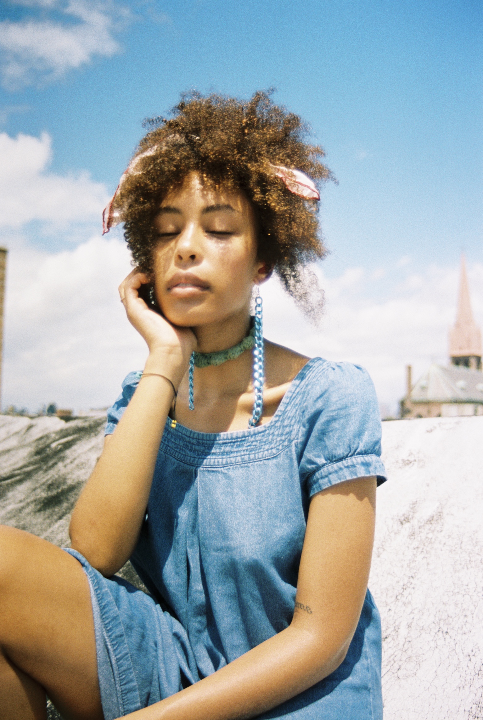 Stazi wearing jewelry from her brand Flourish Wear captured by Natalie Yang.