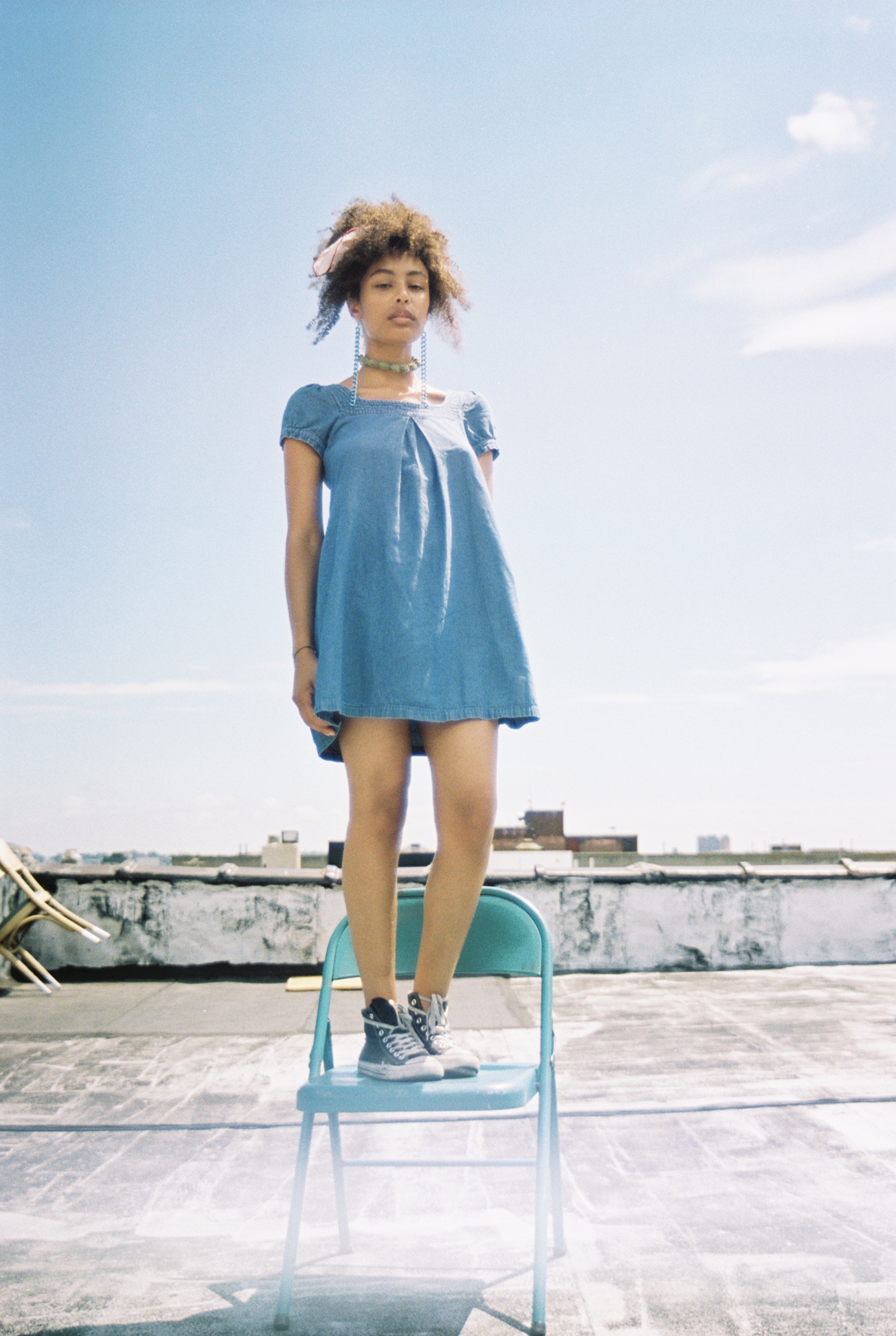 Stazi wearing jewelry from her brand Flourish Wear captured by Natalie Yang.