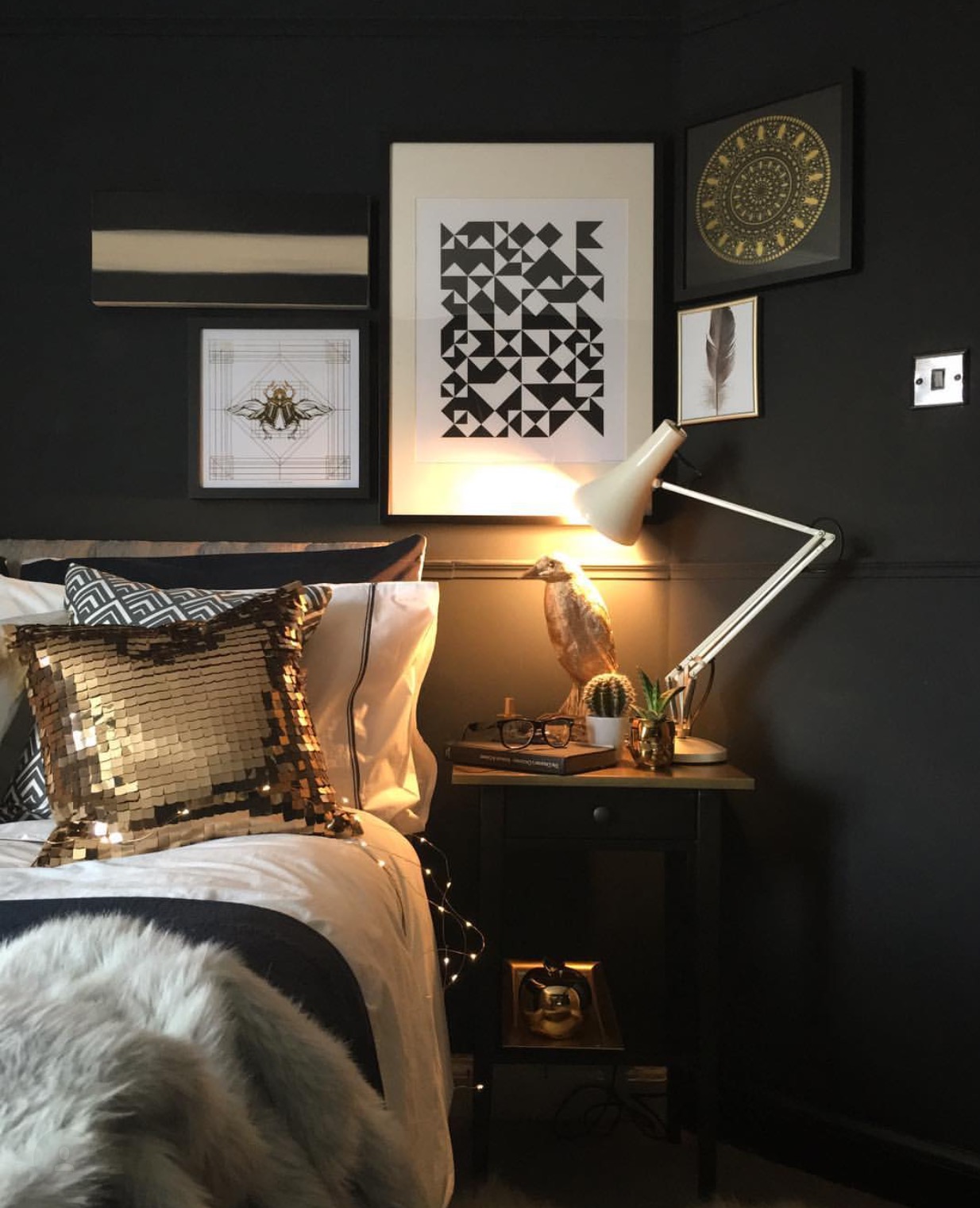 In Nadia's bedroom, the dark and gold theme continues. "The master bedroom has a balcony and views of the garden," Nadia explains.
