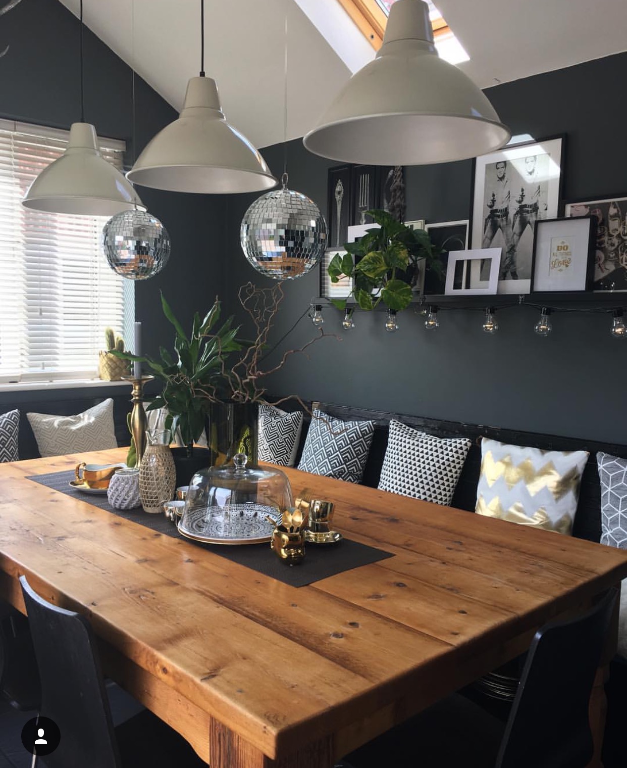 Nadia loves hosting and spending time around the dinner table, which is something I know from first hand experience. She decided early on that she didn’t want chairs around the table. Laying in bed, an idea came to her. "I turned and shook my husband to wake him up and shouted, 'We can make a built-in seating area using our old garage door!' He was most pleased I woke him up to tell him this news. The next day we got about at planning our seating area," Nadia share
