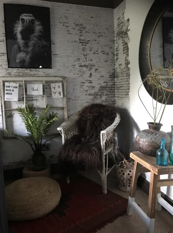 The spare room, most recently decorated by Shelley. Going from dark to white took several coats of paint and I believe lots of gin!. Wallpaper from Rebel walls can be sourced from Shelley's shop, as can the art work