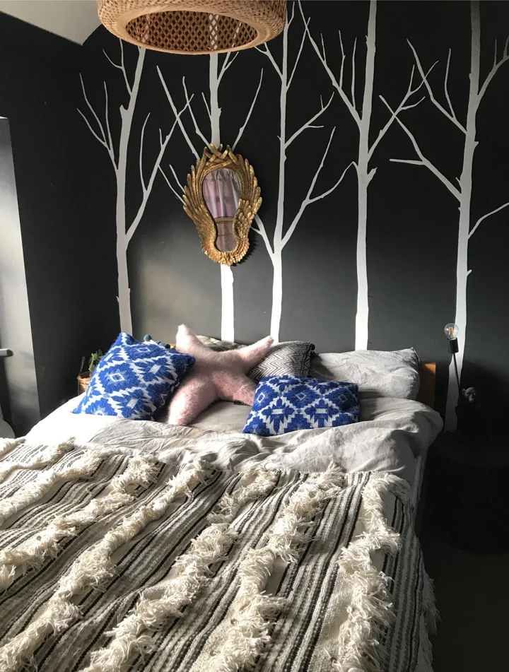 This is the master bedroom, Shelley handpainted the walls
