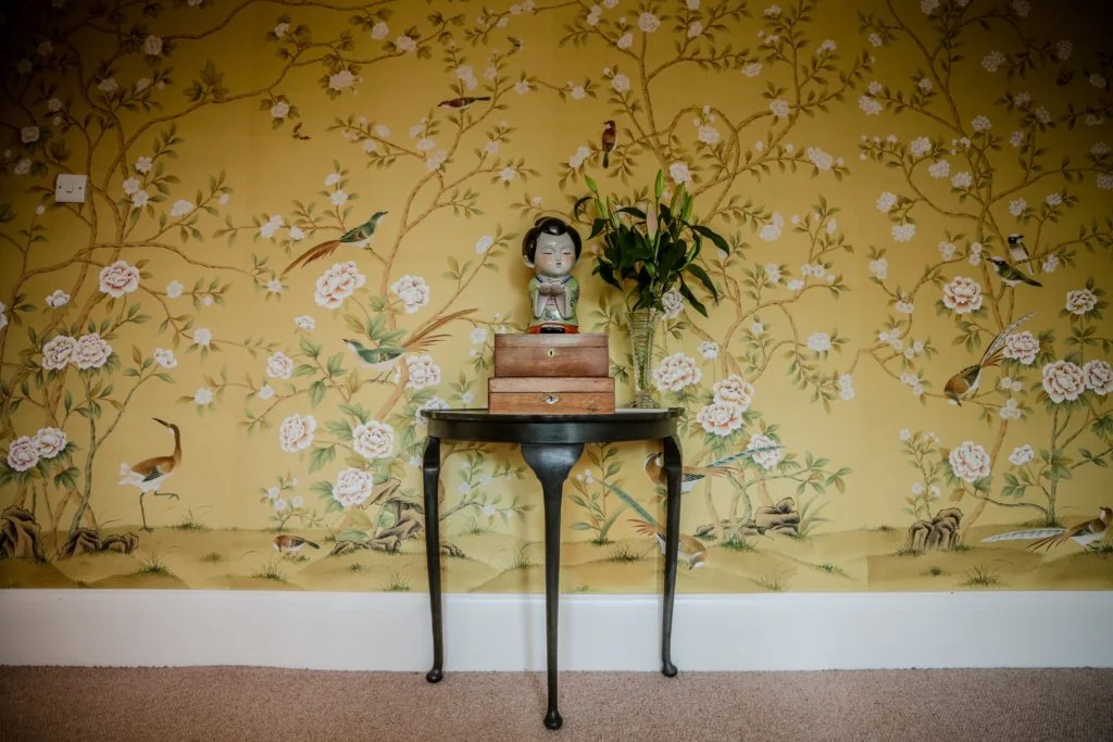Master bedroom interior featuring silk Chinese wallpaper (Credit Clicky McGhee’s)