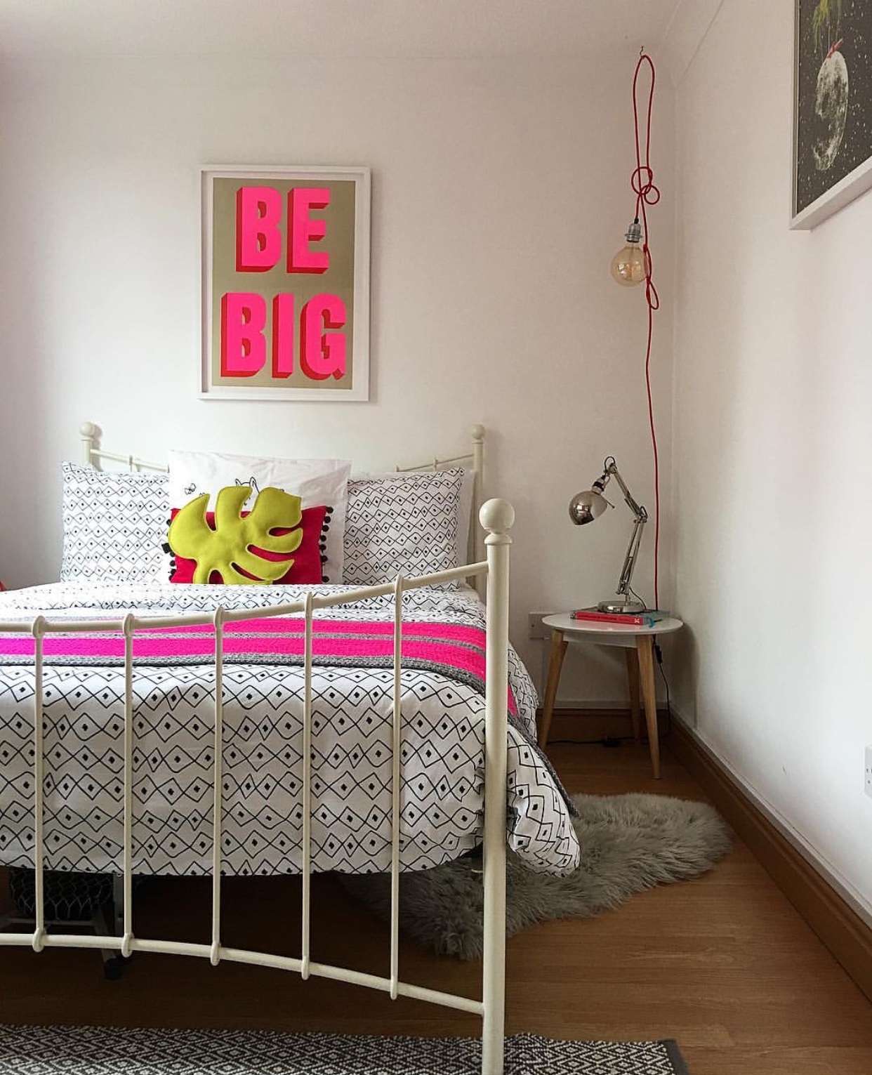 Guest bedroom detail, 'Be Big' print: Print Club London, Bedding: IKEA, Leaf: Sofa Leafs, Red pendant wires: Wickle (independent shop in Lewes, East Sussex)