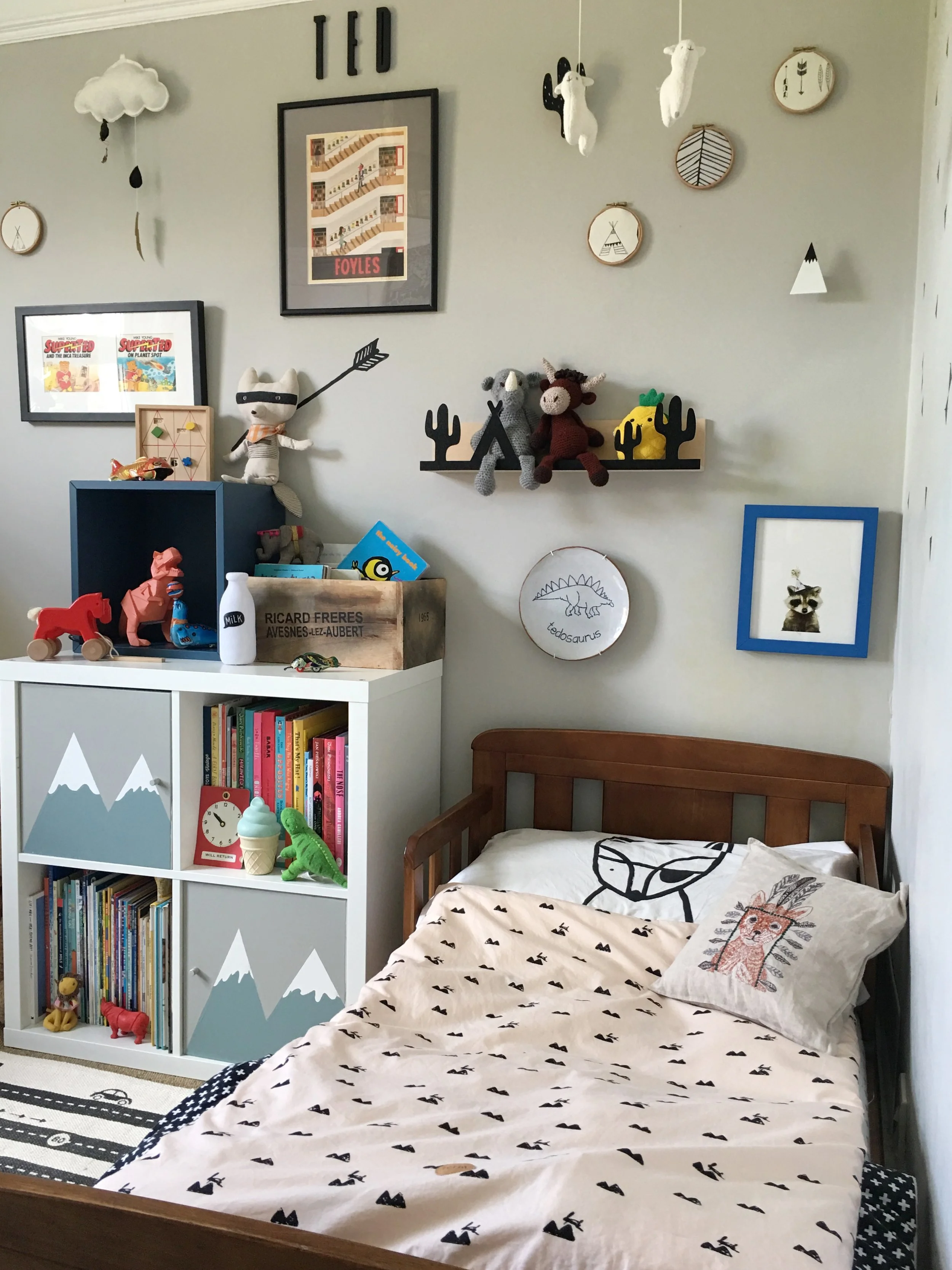 Farrow Ball cornforth white, interior ideas, childrens room decor with a vintage and wooden toys, ikea kallax hack with hand painted mountains ferm living bedding copy.jpg