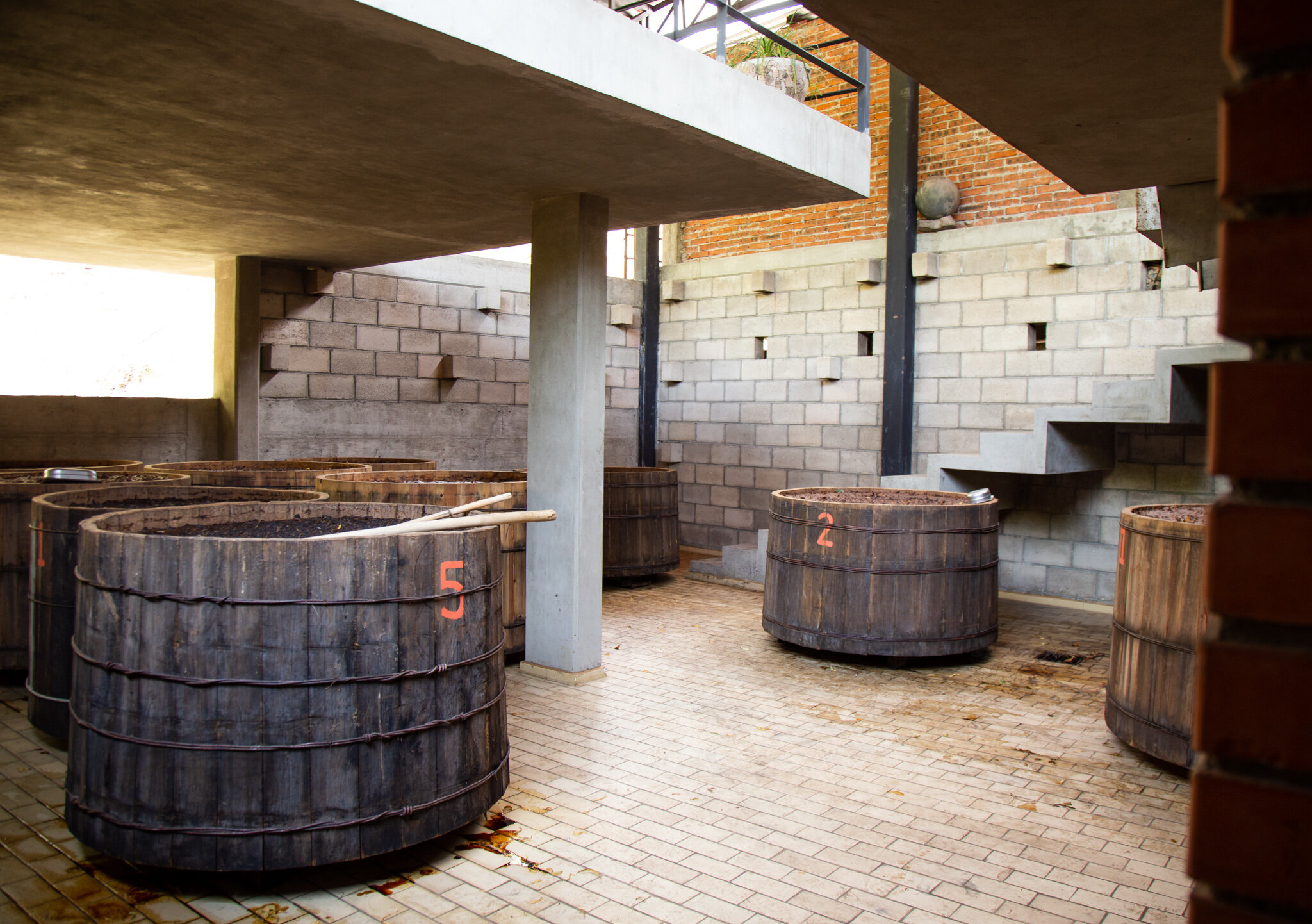 Wooden vats where the agave is stored and fermented