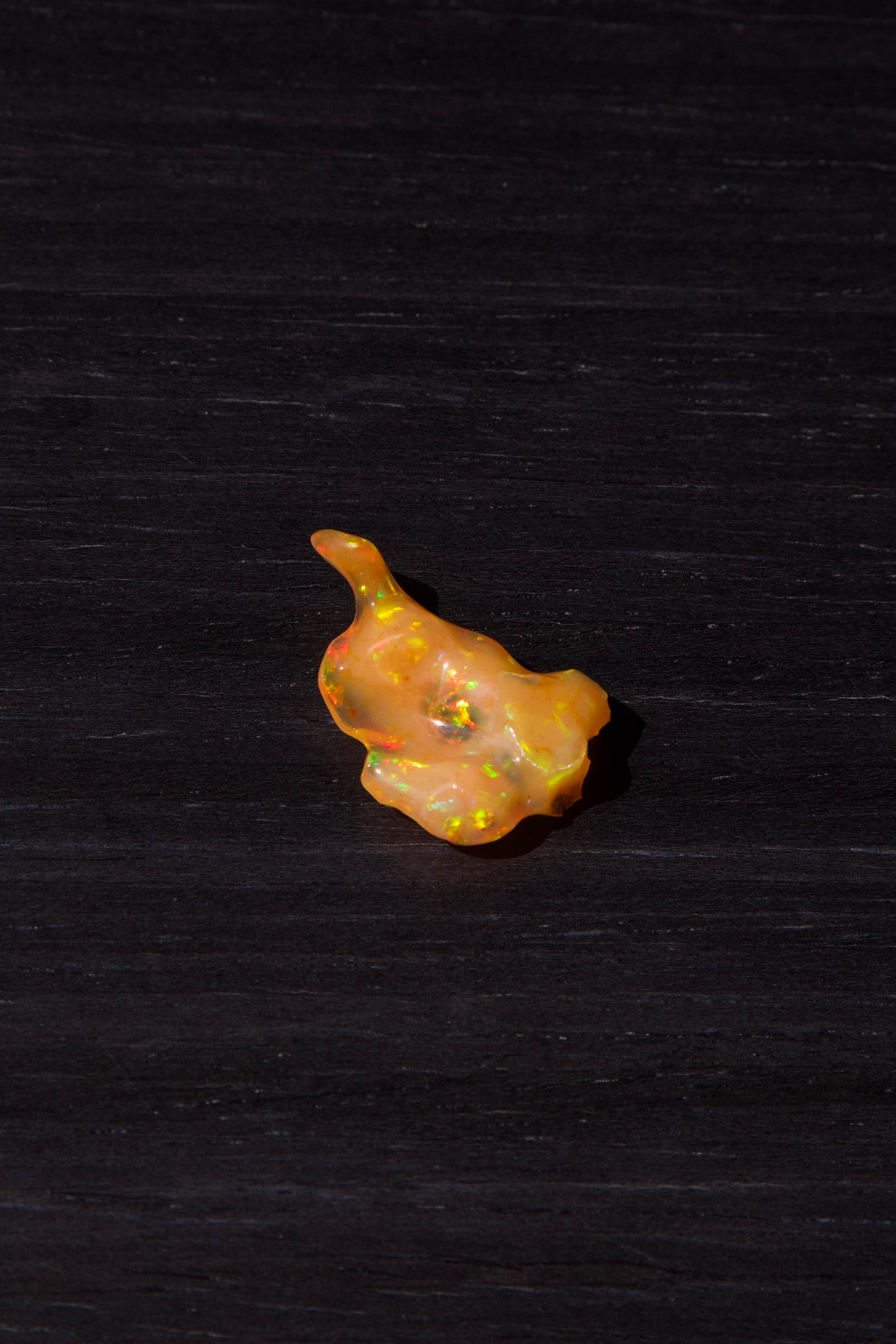 Orange Mexican Fire Opal with play-of-color  we found in La Trinidad, Queretaro