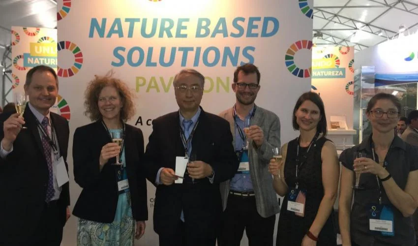 Photo: Mark Smith (IUCN), Andrea Erickson (TNC), Zhang Xinsheng (IUCN President), Chris Baker (Wetlands International), Sarah Davidson (WWF), and Robin Abell (CI) bring out a toast on the opening of the Nature-Based Solutions Pavilion at the 8th World Water Forum in Brasilia,19 March 2018