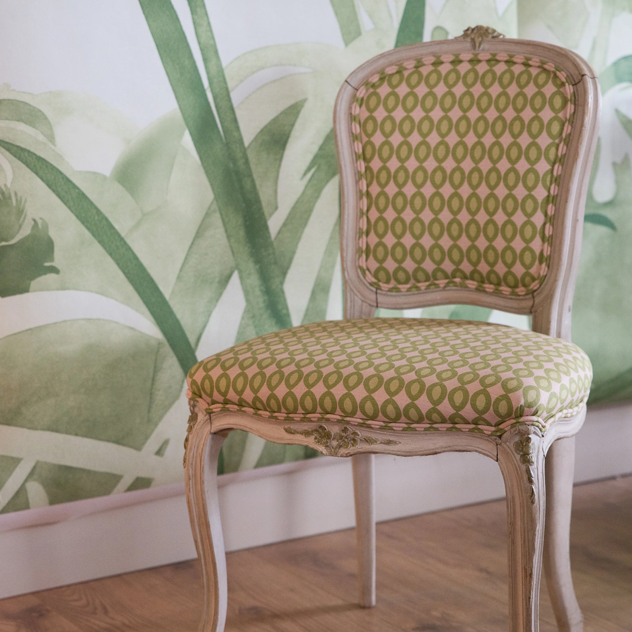 Large Oval - Pink Apple from Hugh St Clair in front of wallpaper from Hugo Dalton’s Tresco Collection, both available at Paint Library London