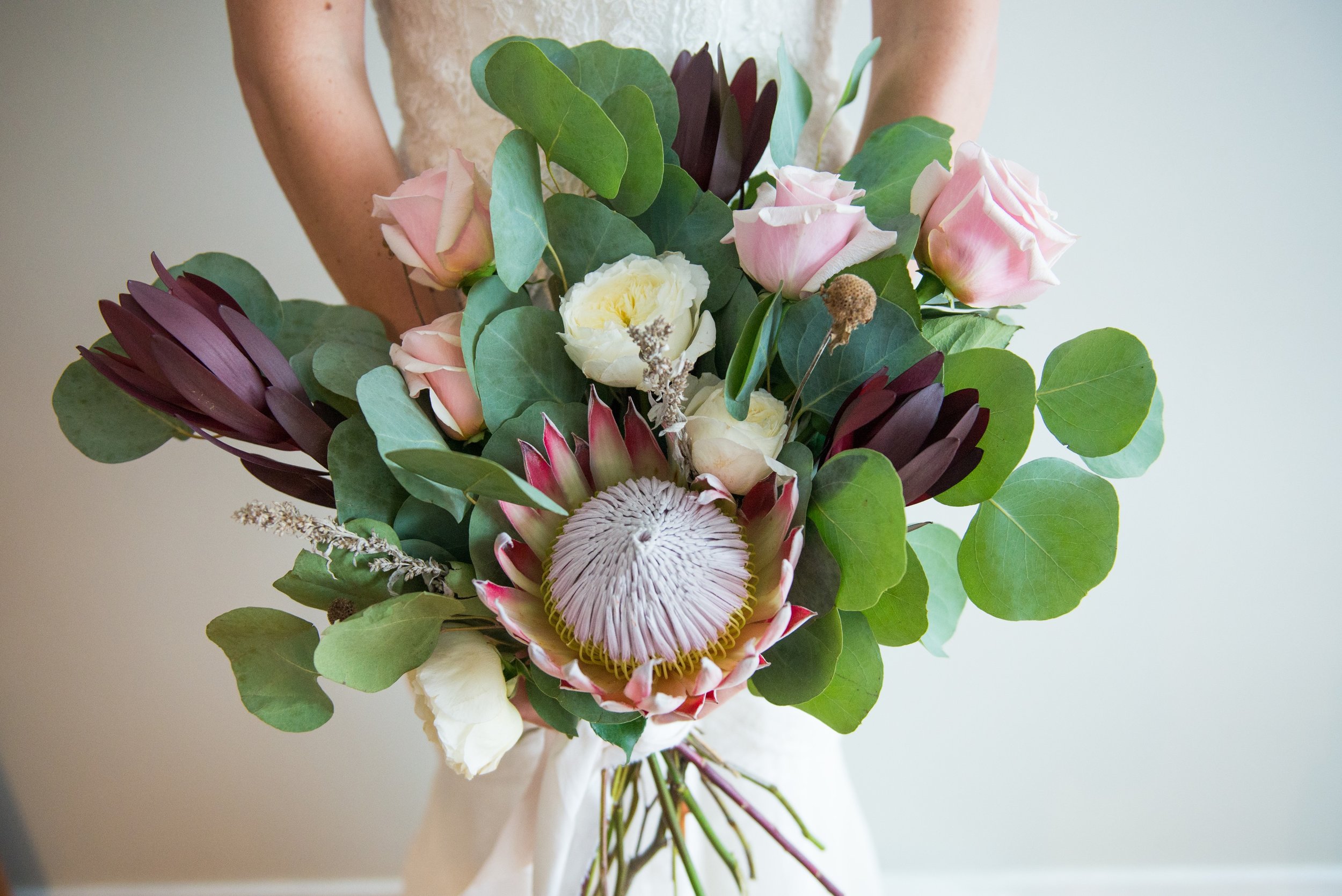 Simple bouquet roses protea