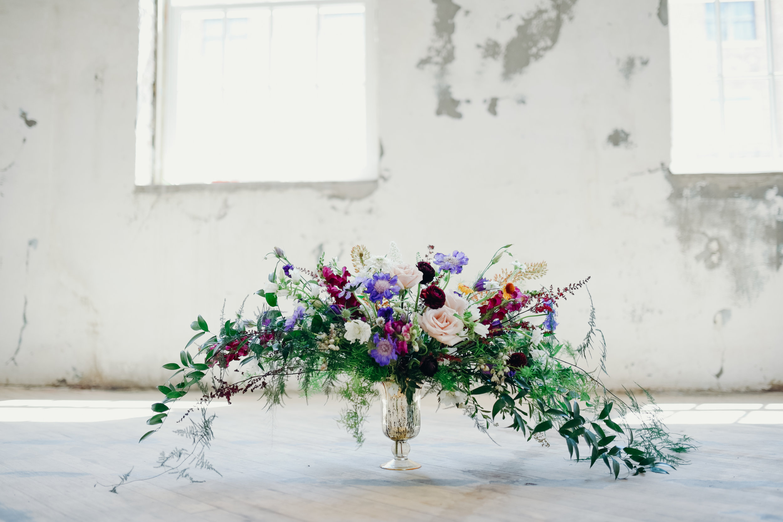 Lush and whimsical floral arrangement 