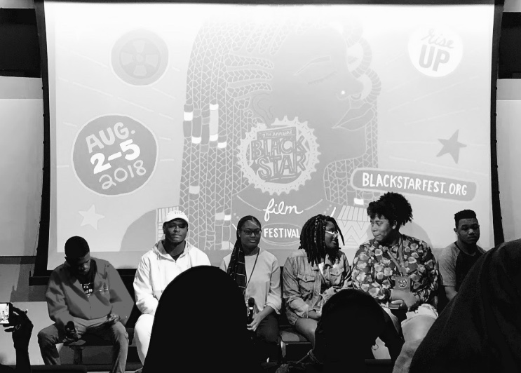 Youth panel fielding questions from the audience after the screening.
