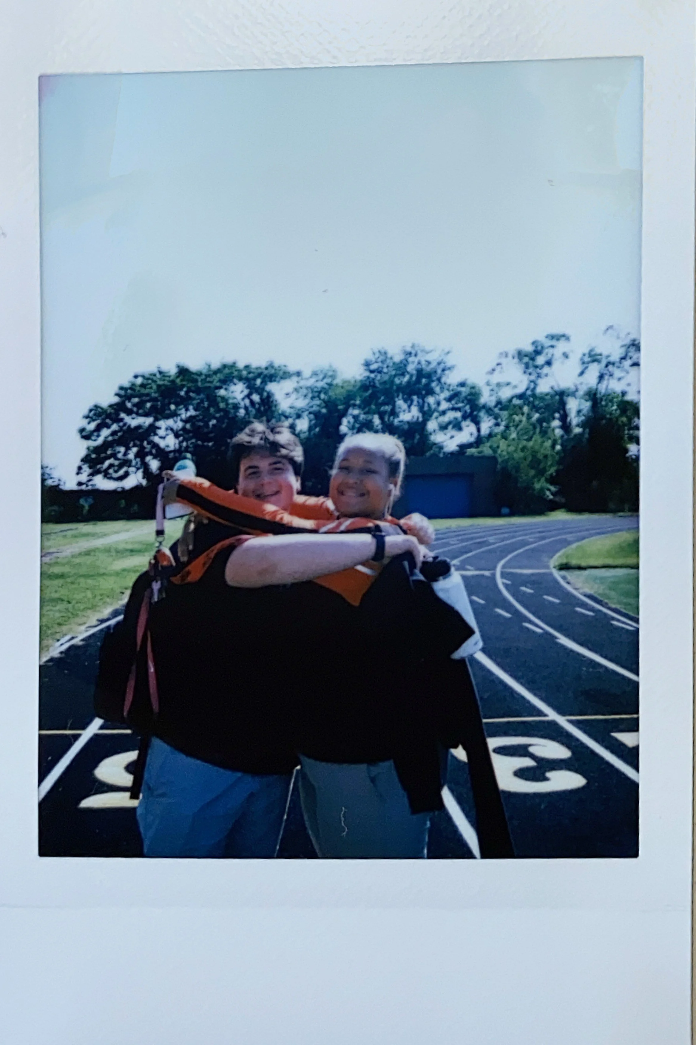 Serena and Max, best friends, sharing a moment during sophomore lunch.